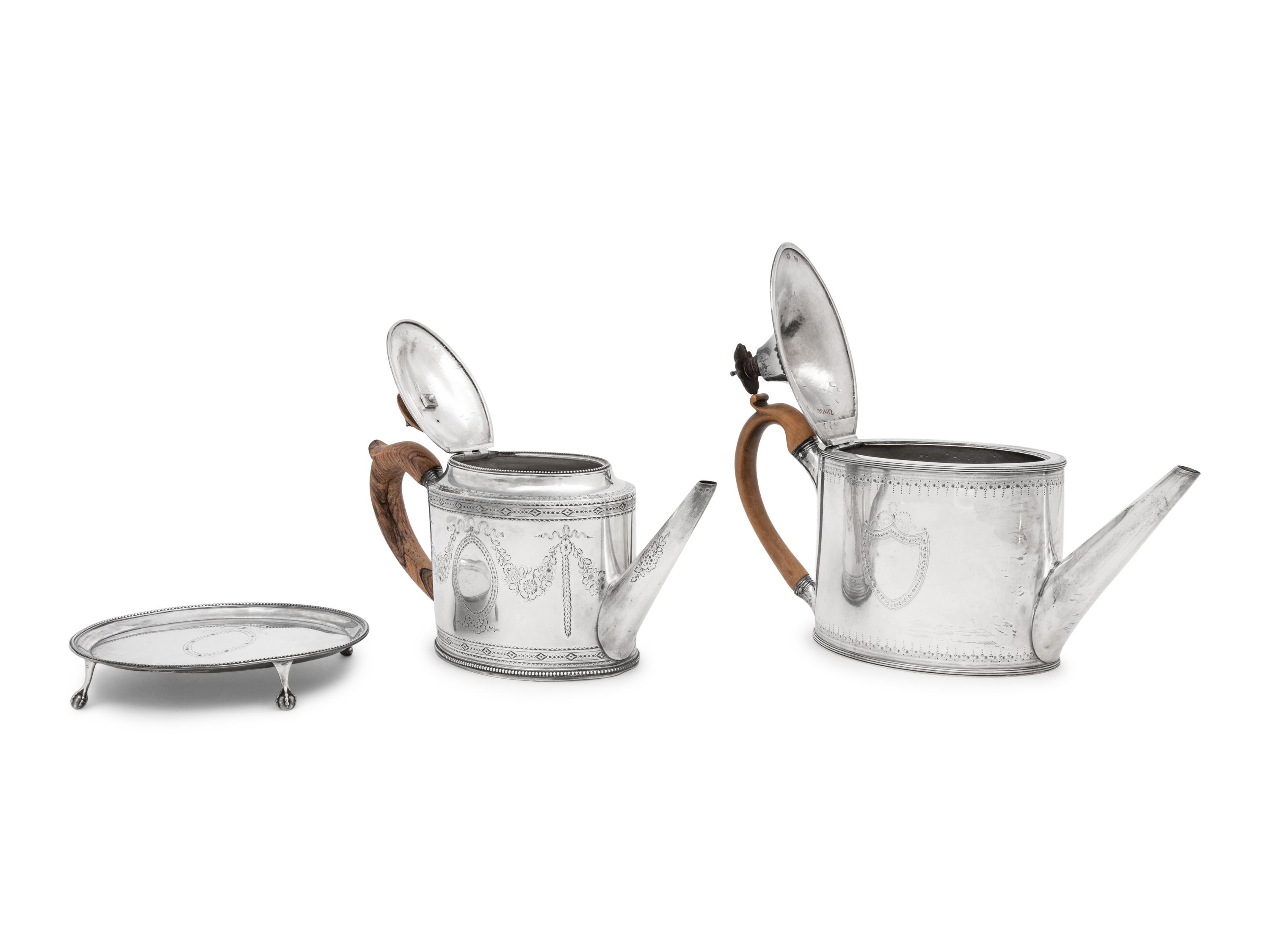 Two Hester Bateman George III Silver Teapots and a Teapot Stand