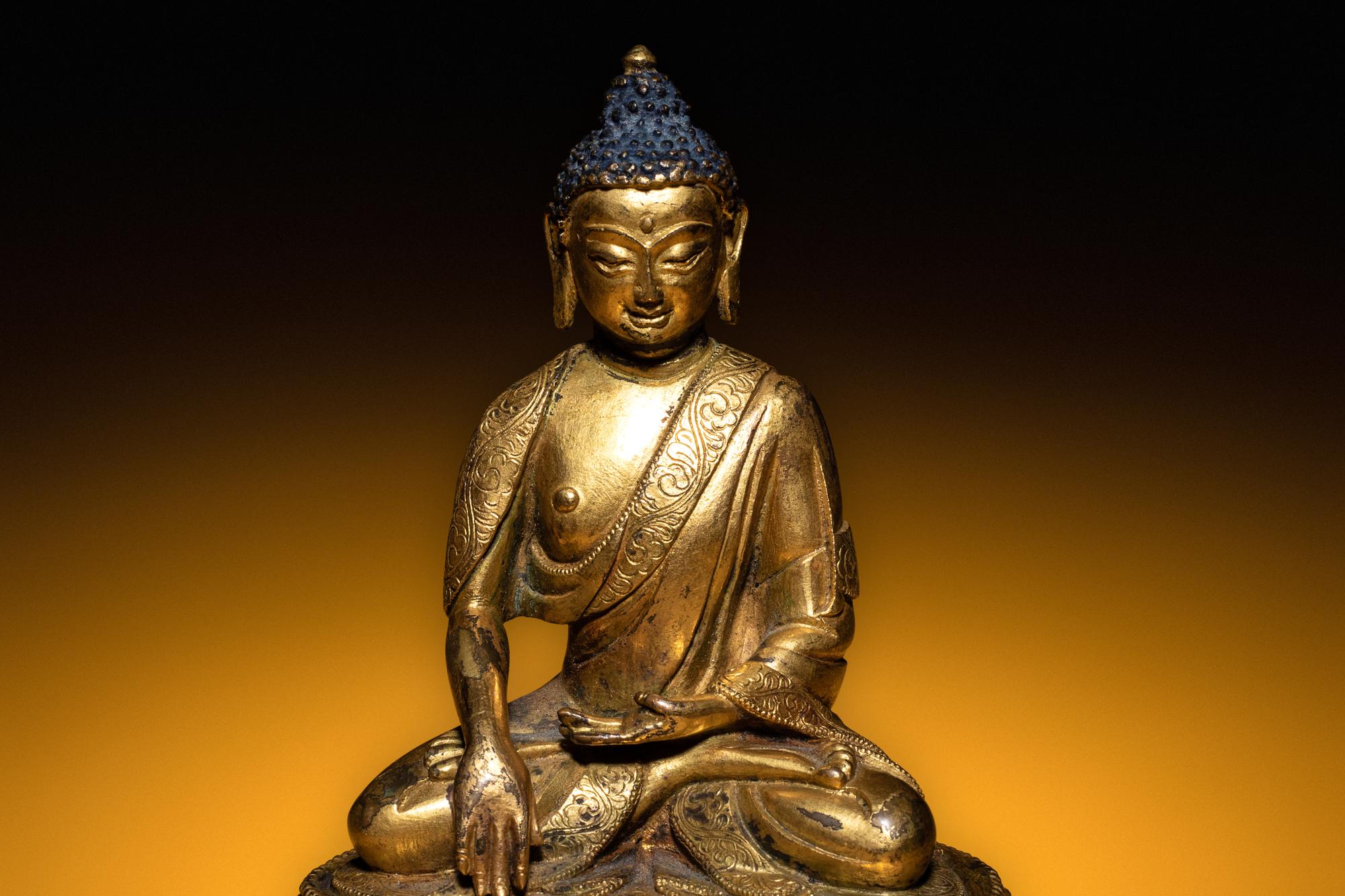 A Small Sino-Tibetan Gilt Bronze Figure of Seated Buddha Shakyamuni