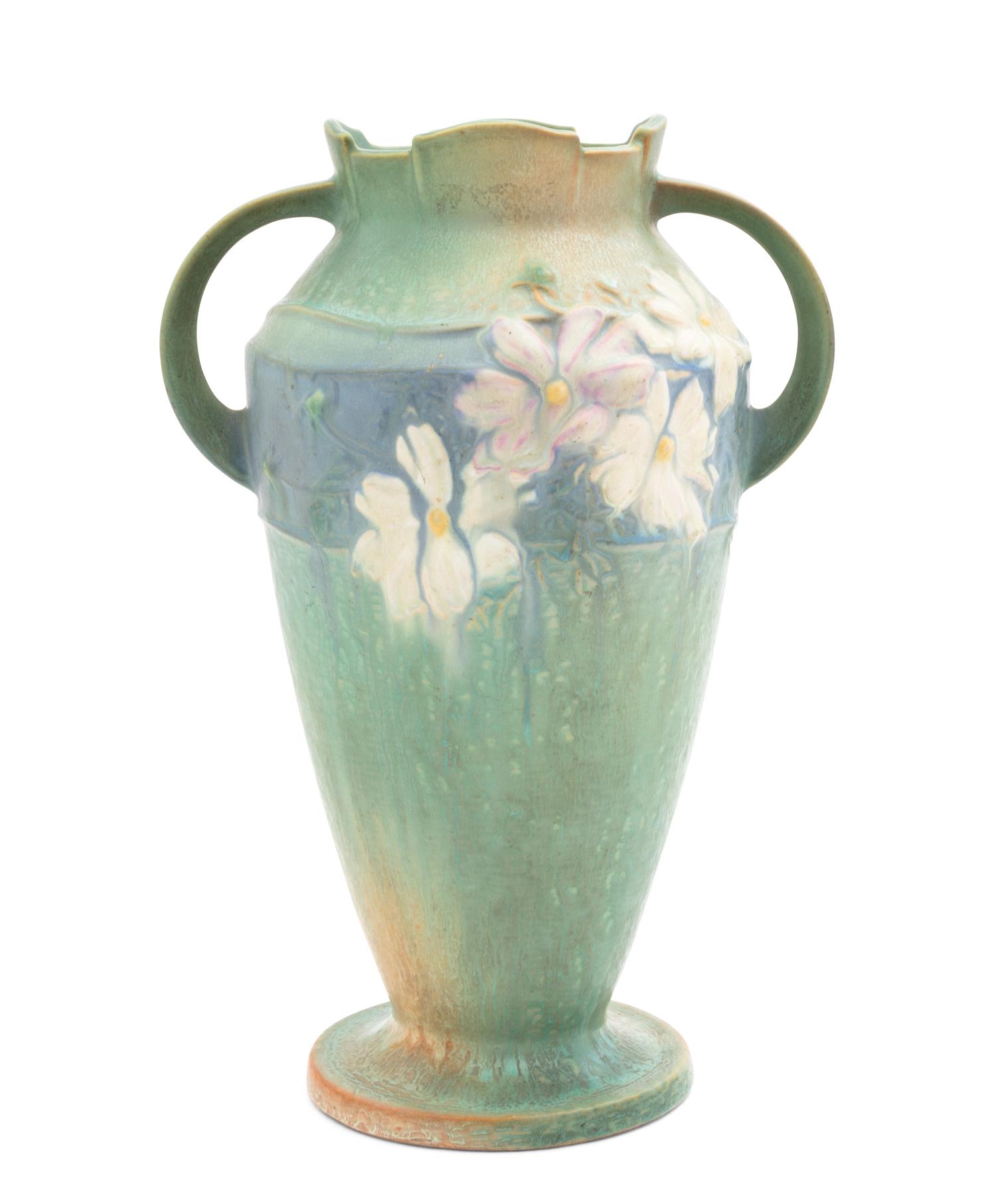 A Roseville Cosmos Pottery Vase Height 12 1/4 inches.