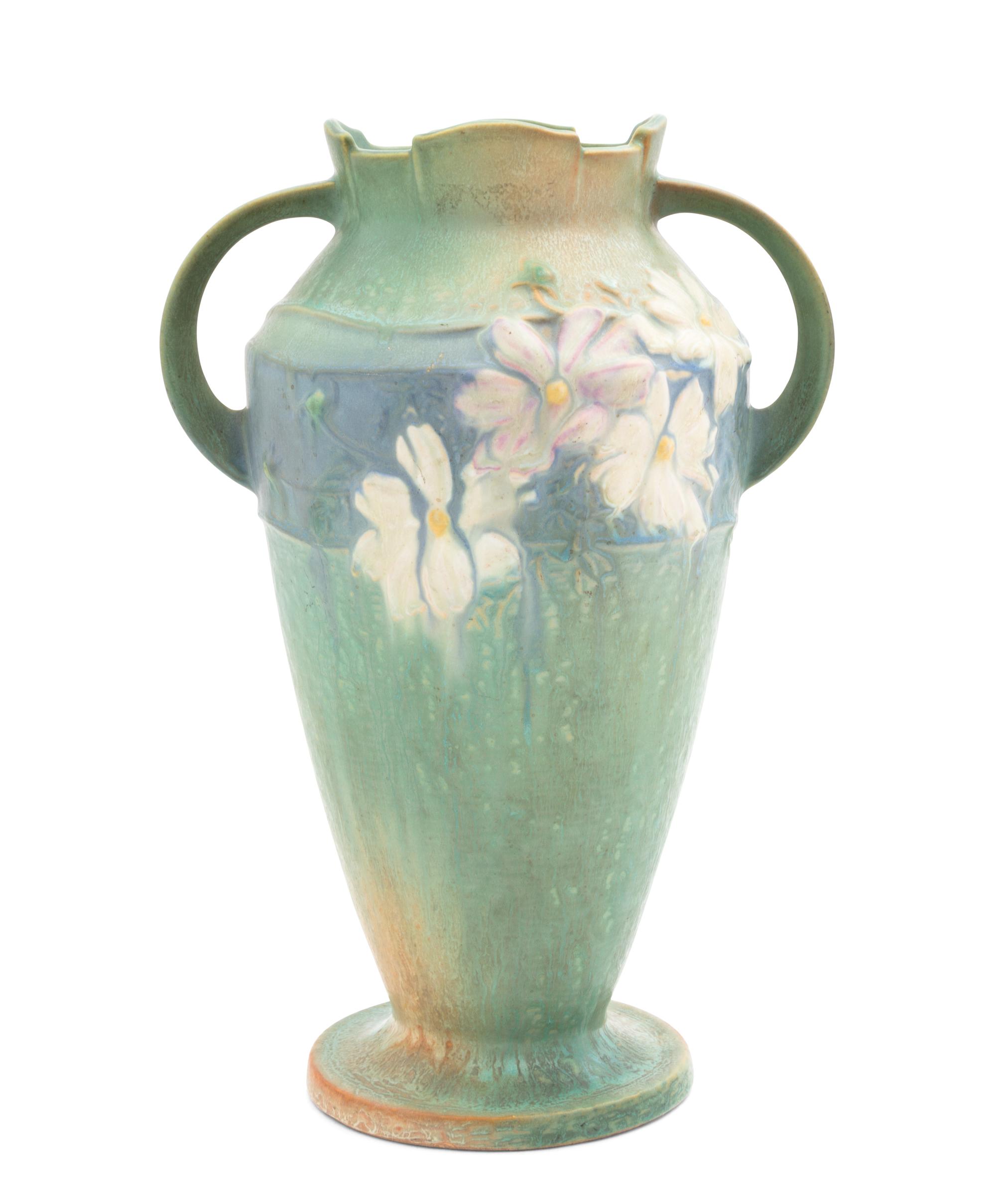 A Roseville Cosmos Pottery Vase Height 12 1/4 inches.