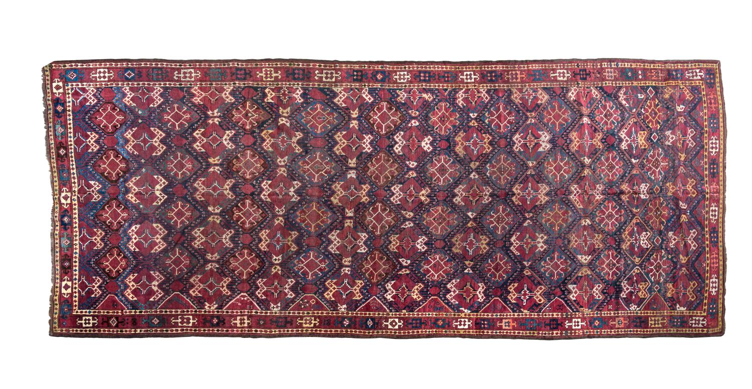 A Northwestern Persian Wool Runner 13 feet 4 inches x 5 feet 10 inches.