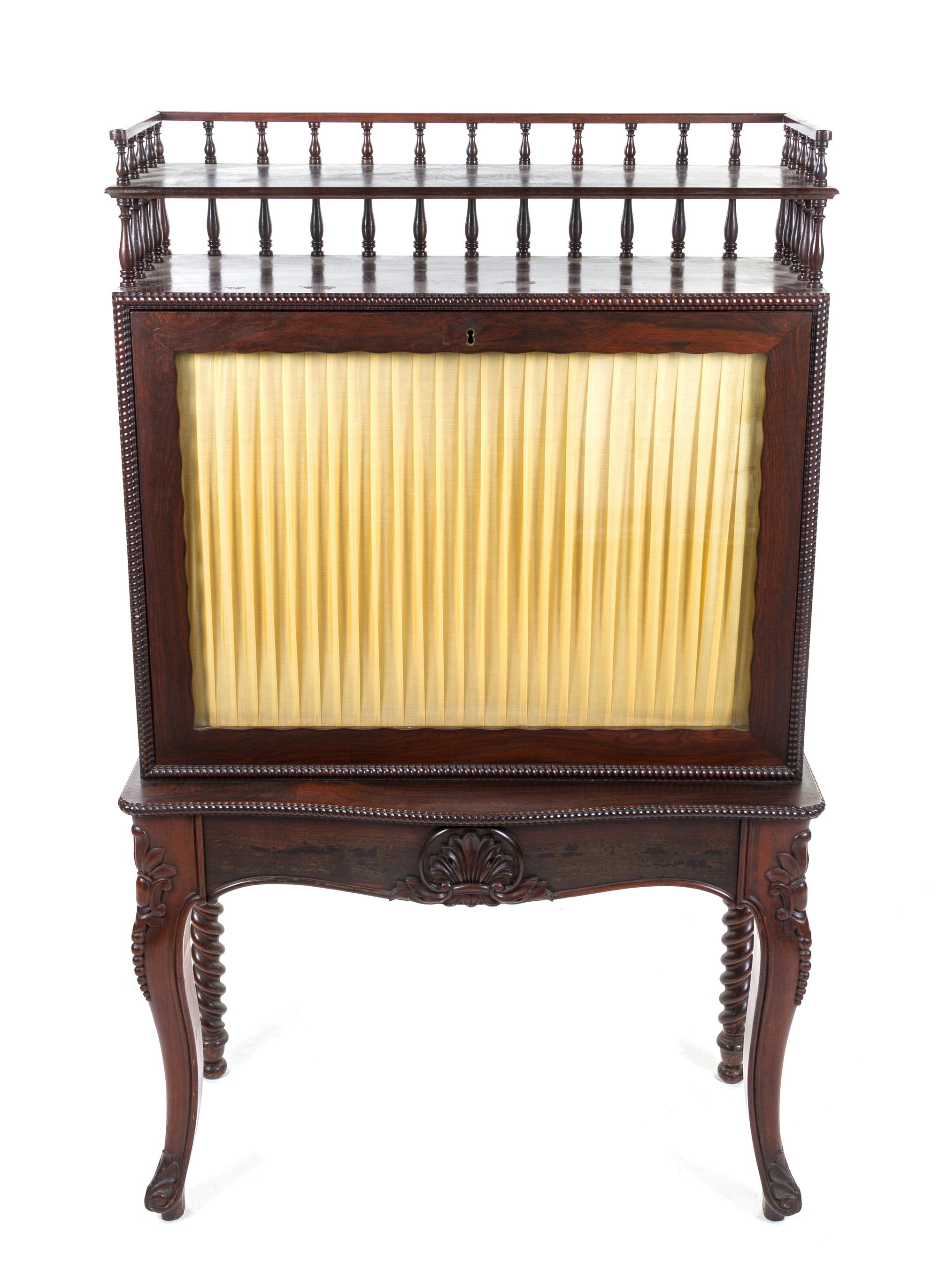 An American Mahogany and Tiger Maple Ladies Writing Desk IN THE MANNER OF THOMAS BROOKS Height 55 1/4 x width 33 1/2 x depth 14 inches. — IN THE MANNER OF THOMAS BROOKS