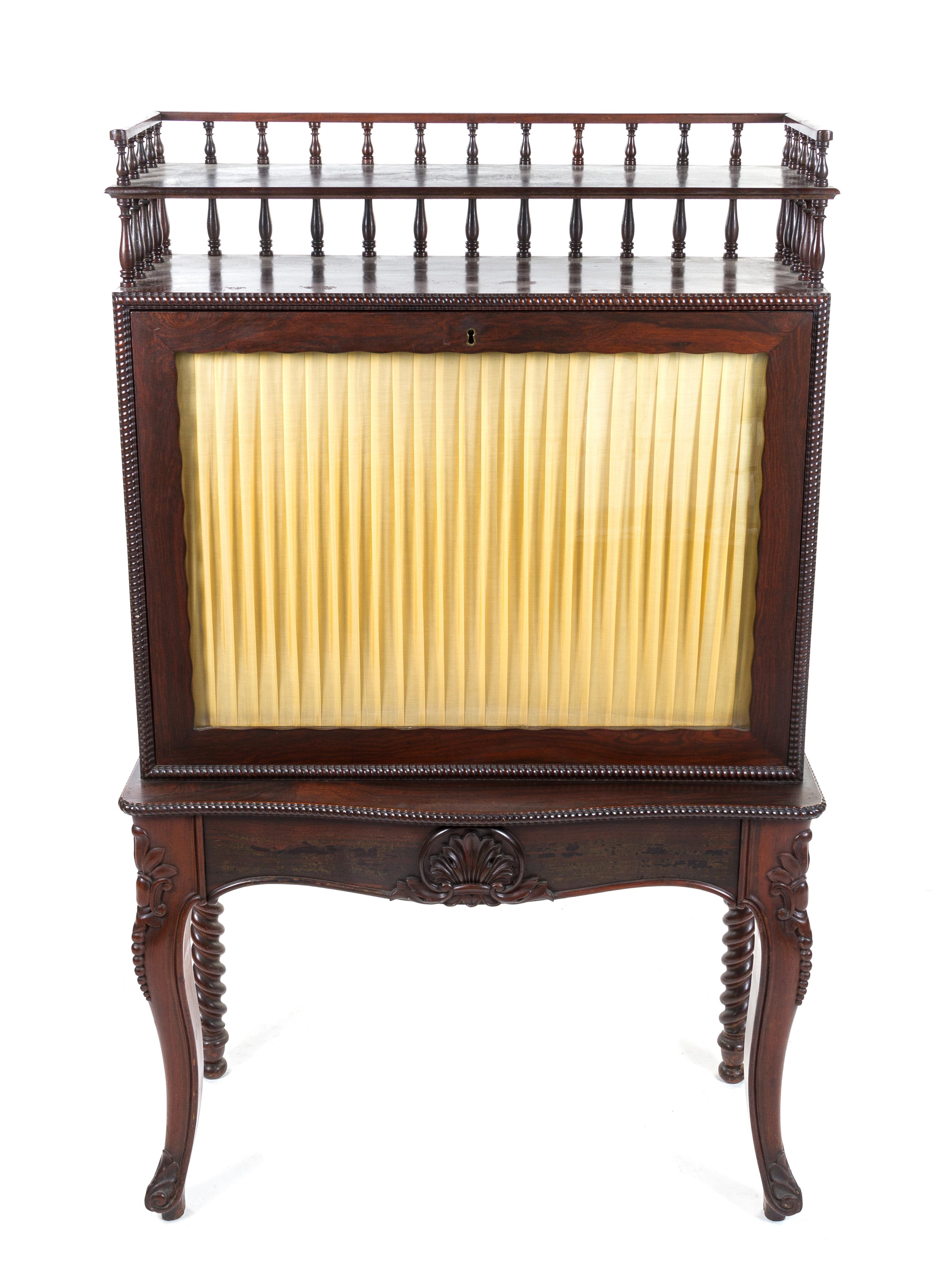 An American Mahogany and Tiger Maple Ladies Writing Desk IN THE MANNER OF THOMAS BROOKS Height 55 1/4 x width 33 1/2 x depth 14 inches. — IN THE MANNER OF THOMAS BROOKS