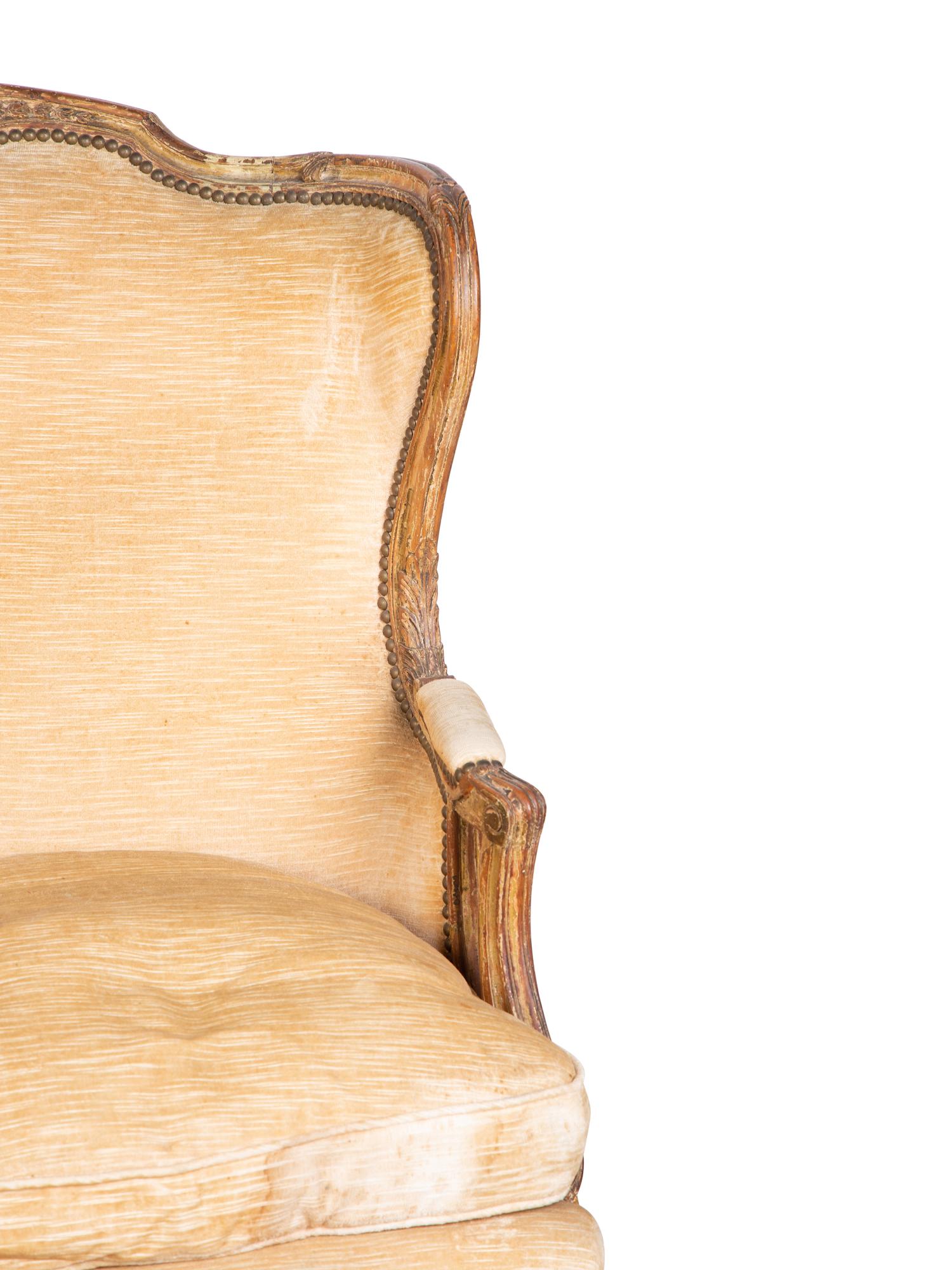 A Pair of Louis XV Style Giltwood Bergères a Oreilles — 19TH CENTURY