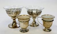A Set of Twelve Silver Dessert Cups, International Silver Co., in two patterns, eleven having glass liners, together with six demitasse