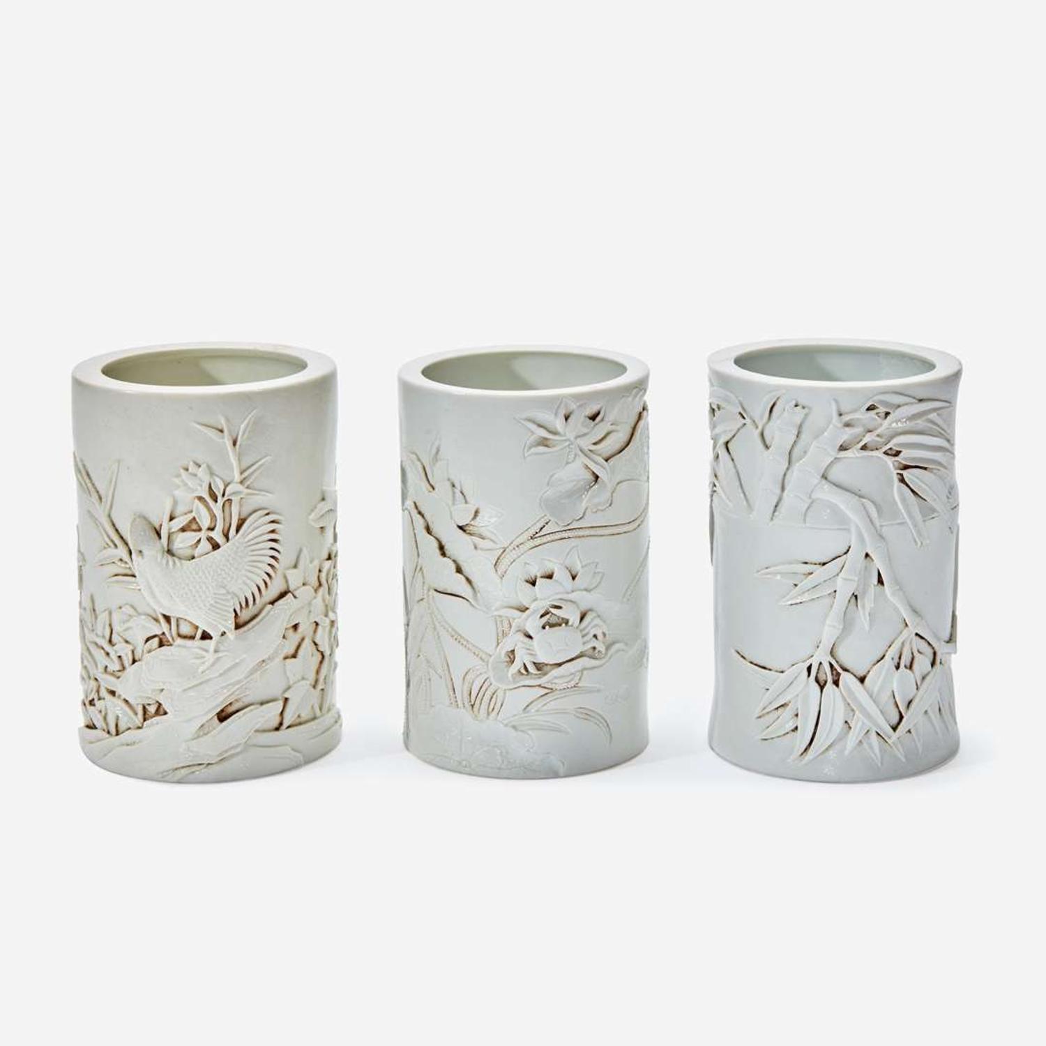 Three Chinese molded and carved porcelain brushpots 瓷塑雕刻笔筒一组三件 Mark of Wang Bingrong ????