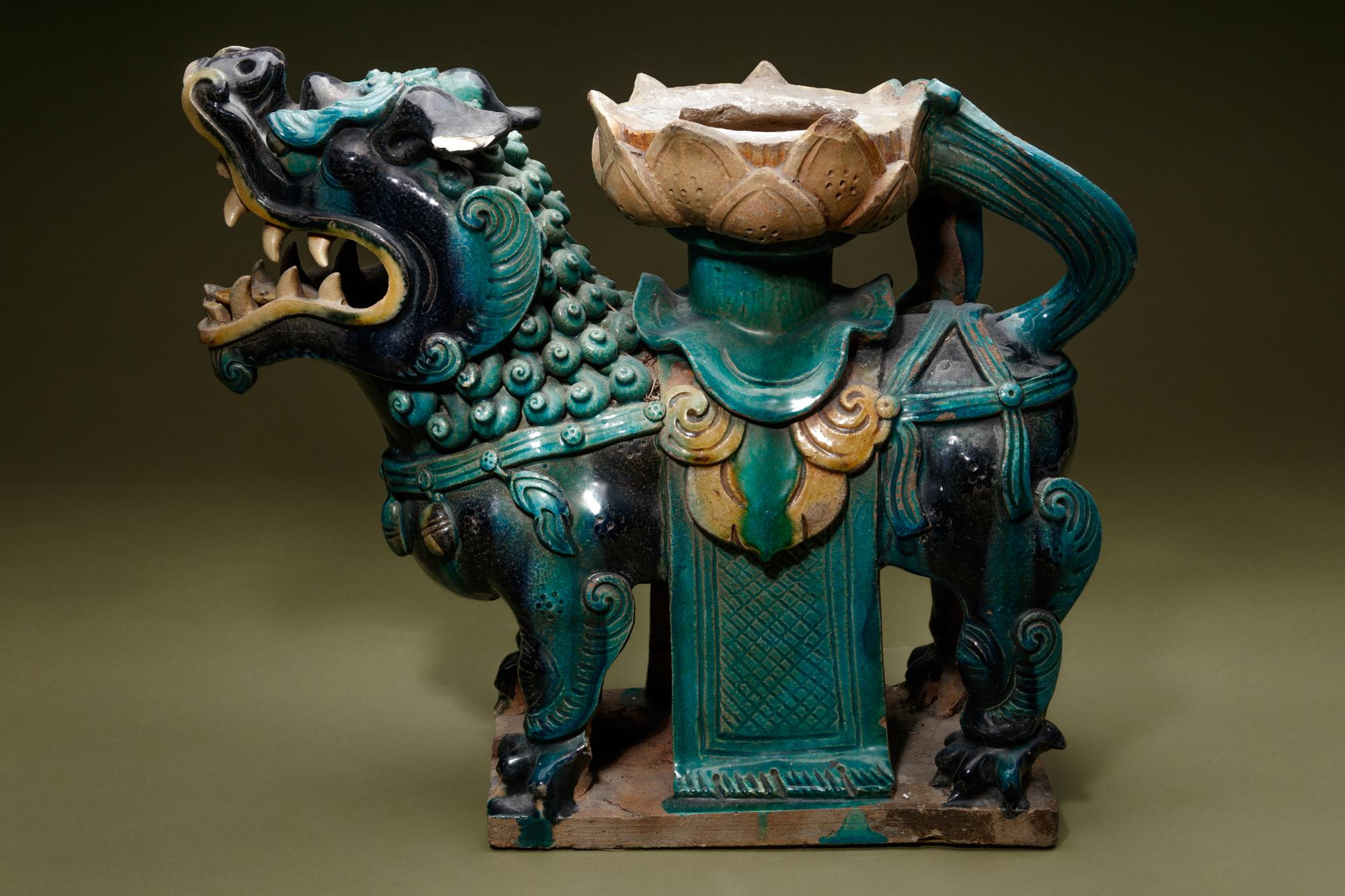 A Turquoise, Blue and Yellow Glazed Tilewoks 'Lion' Stand