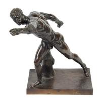 A Continental Bronze figure Height 19 1/4 x width 13 1/2 inches. — AFTER THE ANTIQUE BY AGASIAS OF EPHESOS