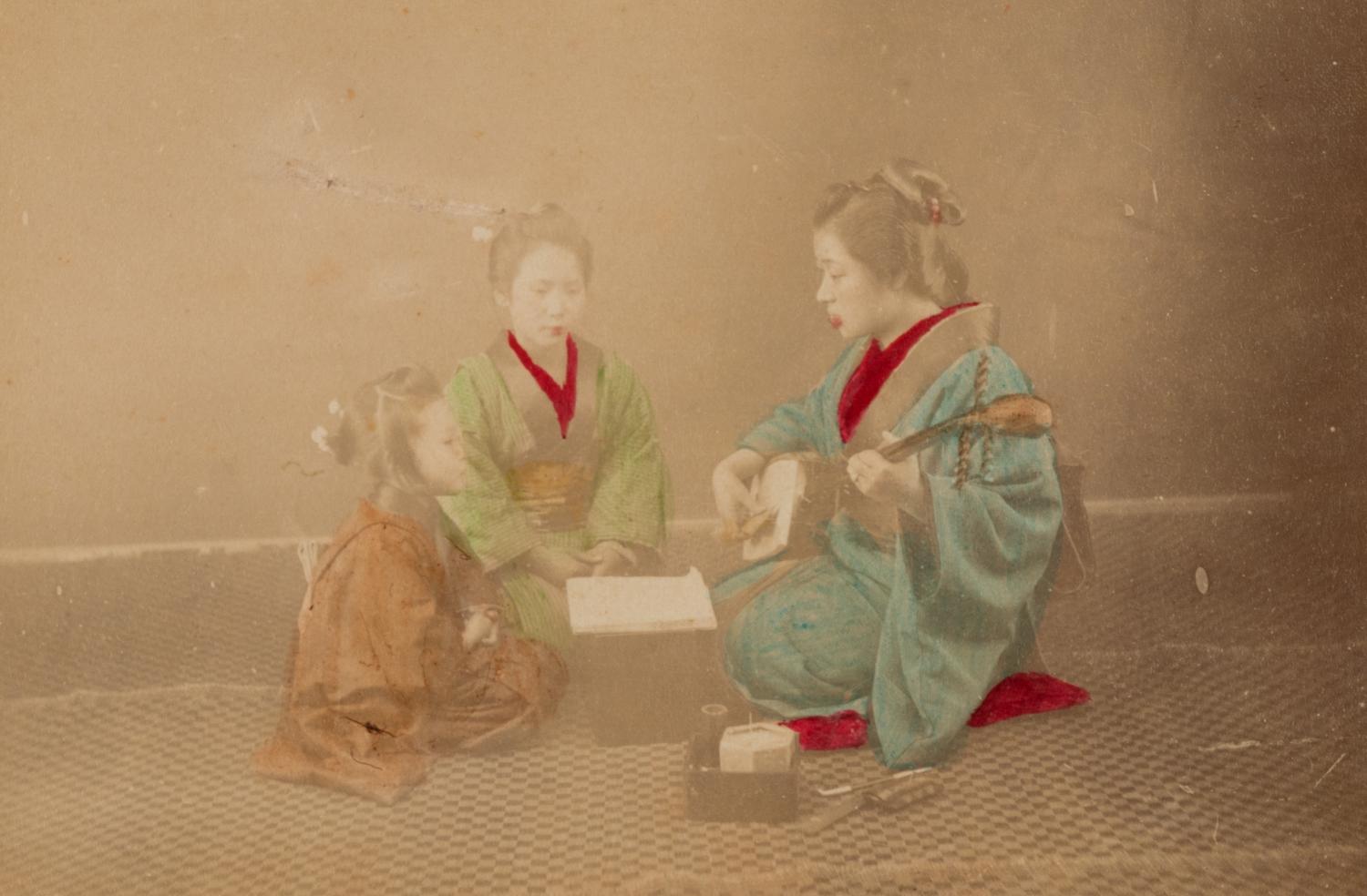 Four Japanese Hand Tinted Photographs