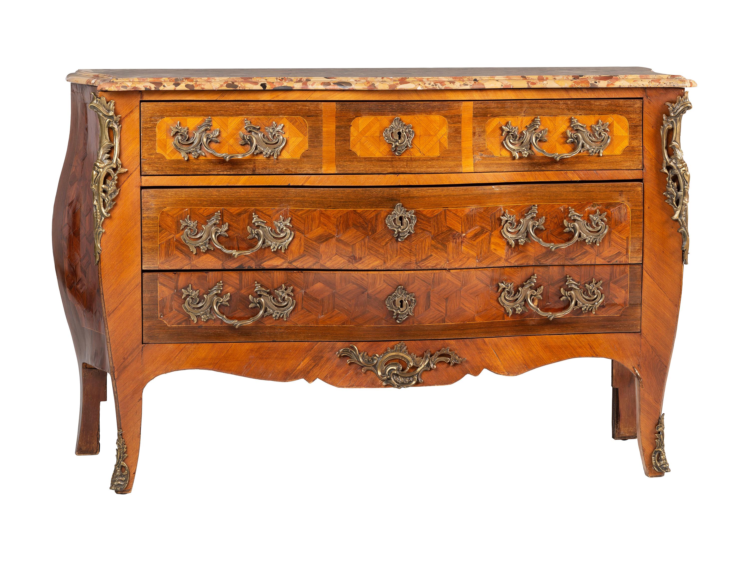 A Régence Style Bronze Mounted Marble Top Marquetry Commode