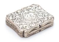 A Victorian Silver Vinaigrette, Edward Smith, Birmingham, 1844, the lid decorated with a pastoral scene, the case with floral and folia
