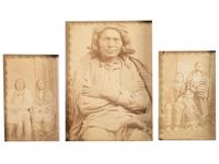 [NATIVE AMERICAN]. A group of 2 folk art carved frames containing photographs of Native American subjects.