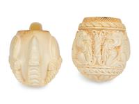 A Group of Nine Carved Meerschaum and Wooden Pipes