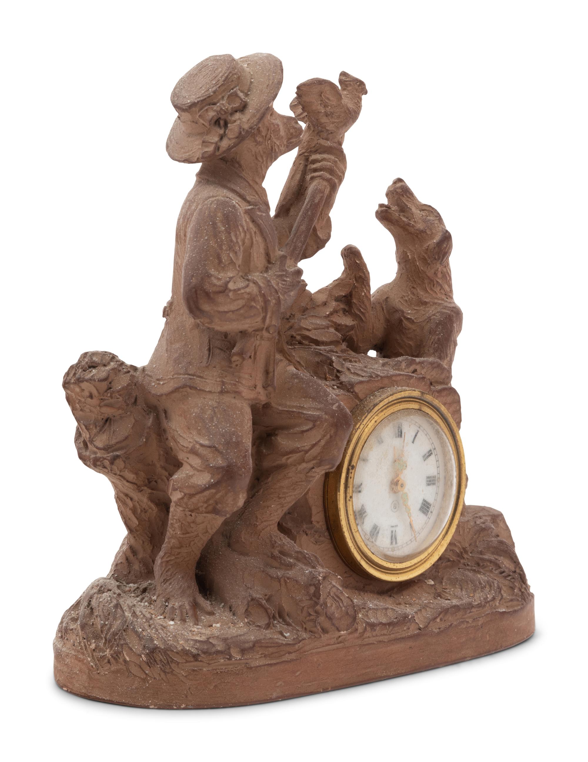 A Continental Terra Cotta Figural Clock