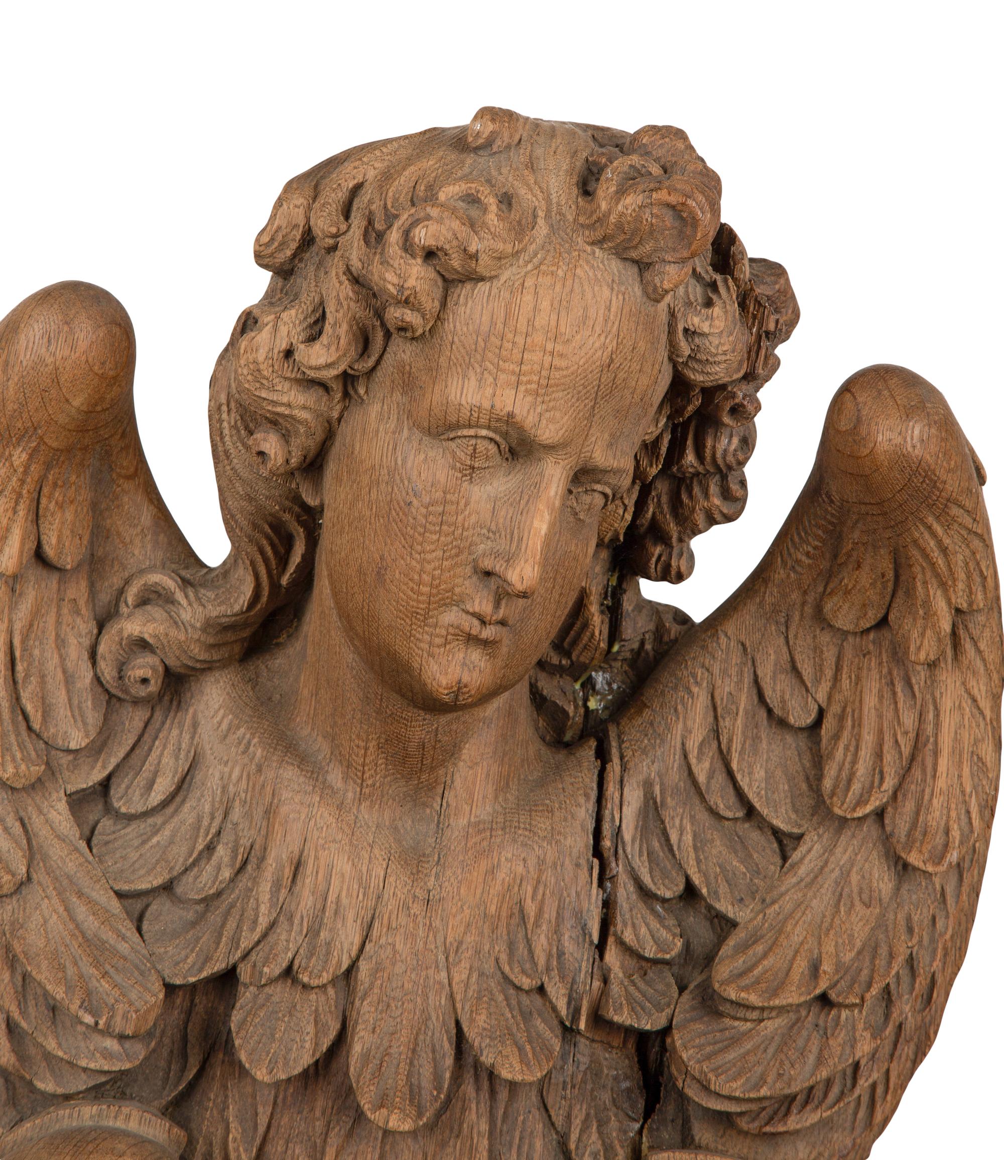 A Pair of Continental Oak Figural Pilasters — 17TH CENTURY