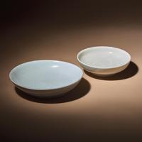 Two Chinese Blanc-de-Chine Porcelain Shallow Bowls, Ming Dynasty — 明 德化白瓷圈足盤兩件