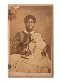 [EARLY PHOTOGRAPHY]. SCHLEIER, T.M., photographer. CDV of an African American nanny holding a white baby. Nashville, TN.