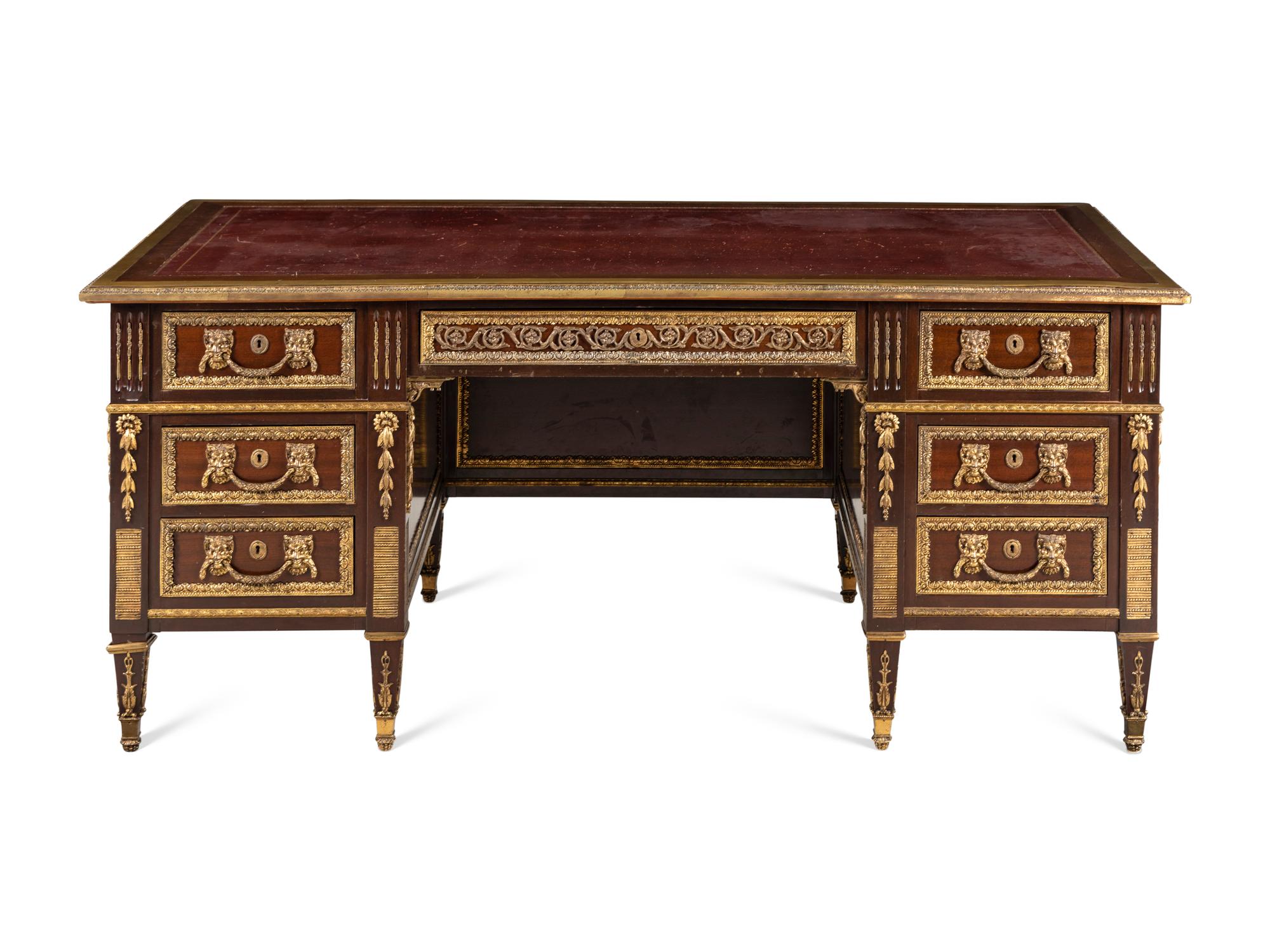 A Louis XVI Style Gilt Bronze Mounted Mahogany Bureau Plat