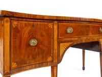 A George III Satinwood Inlaid Figured Mahogany Serpentine-Front Sideboard
