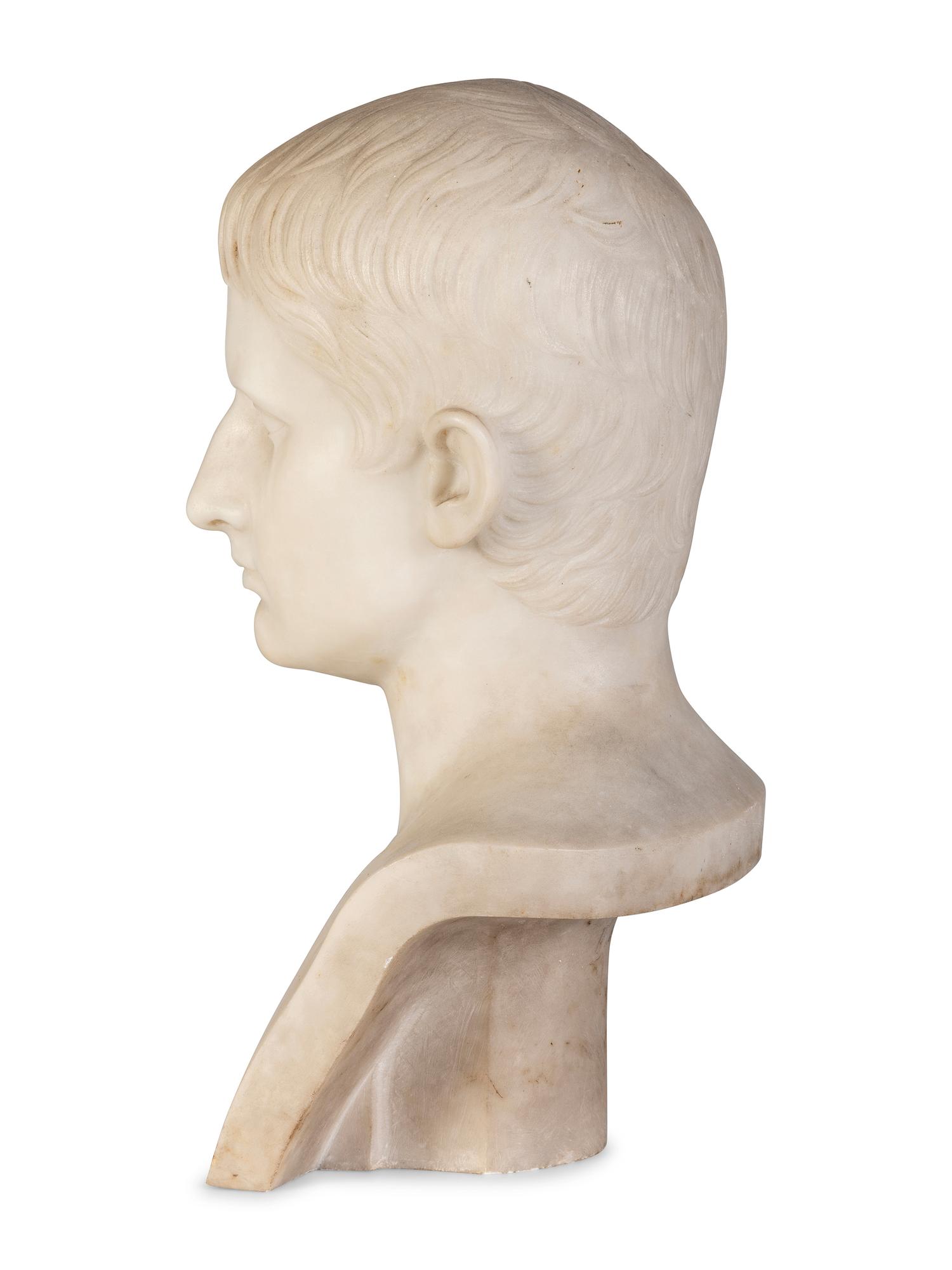 A Carved Marble Bust of a Young Man