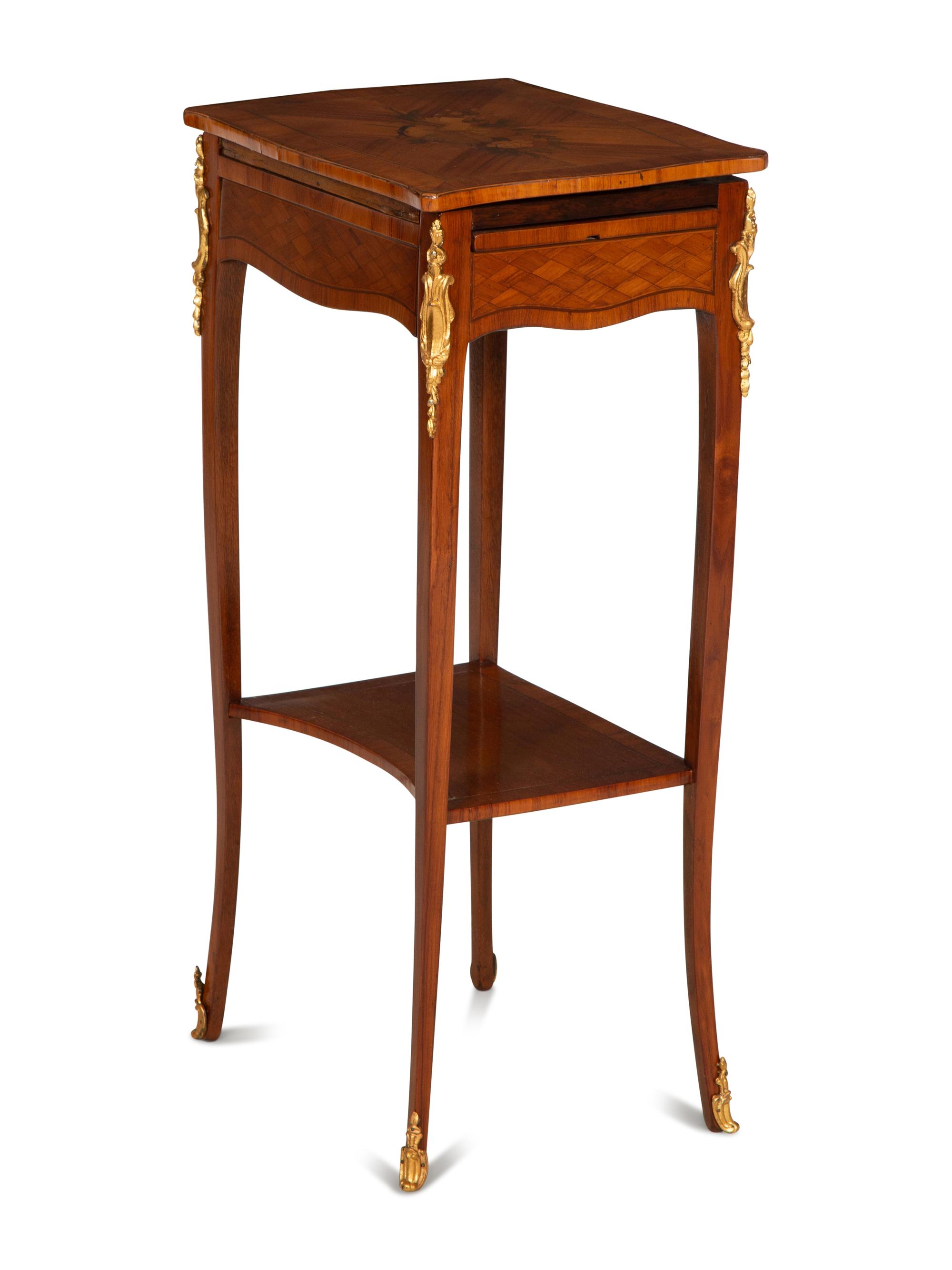A Louis XV/XVI Transitional Gilt Bronze Mounted Marquetry Library Table