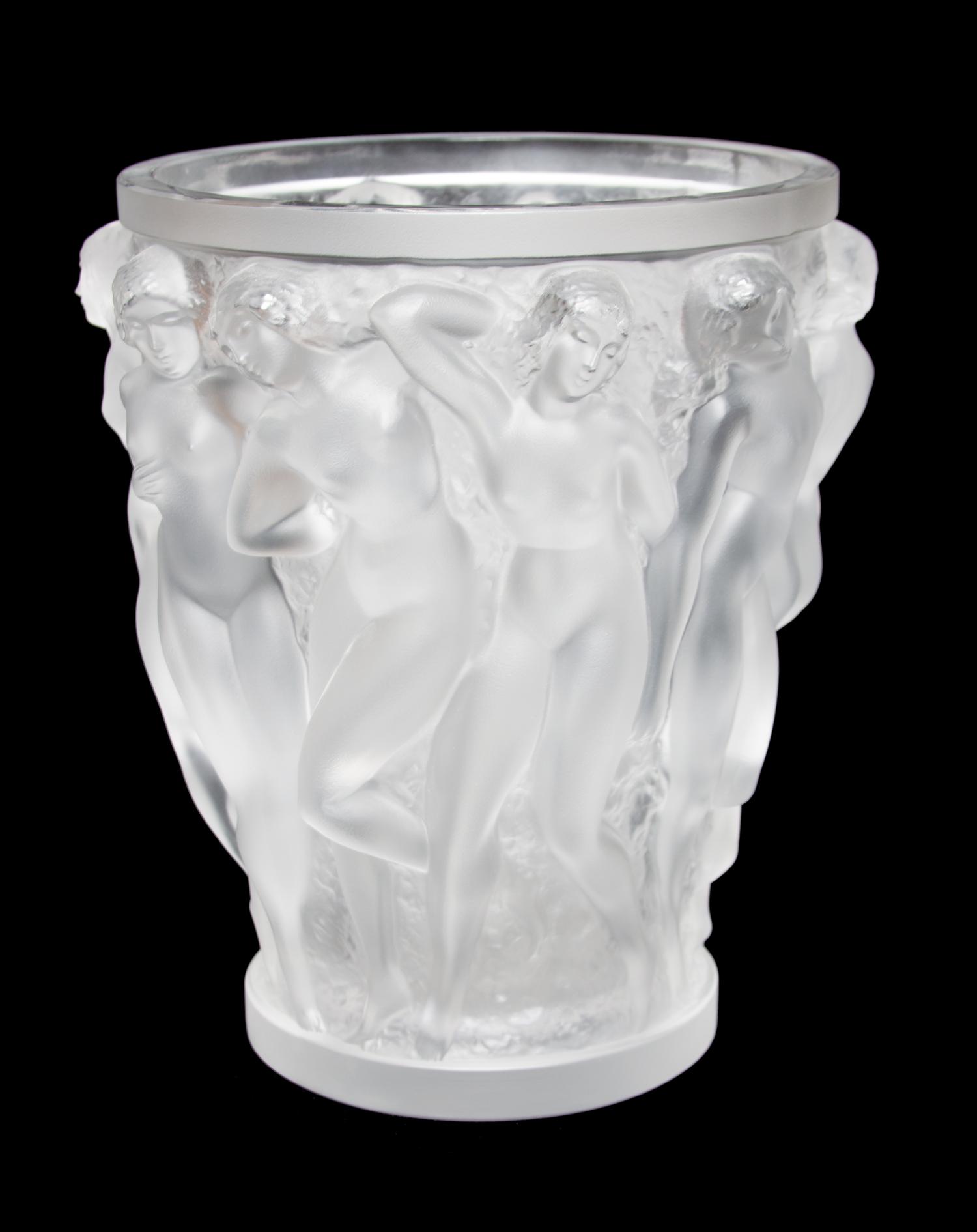 A Lalique Molded and Frosted Glass Vase Height 9 5/8 inches.