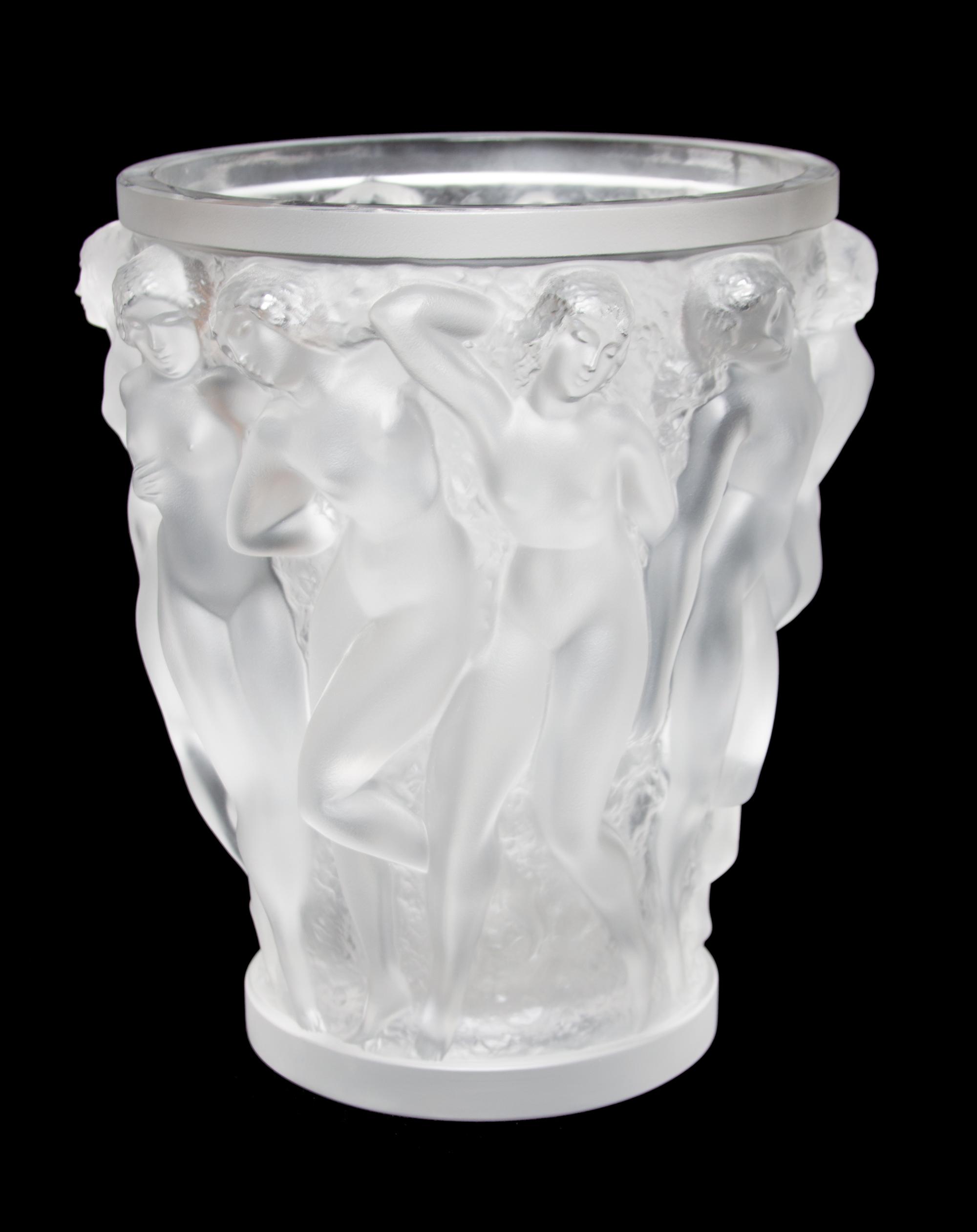 A Lalique Molded and Frosted Glass Vase Height 9 5/8 inches.