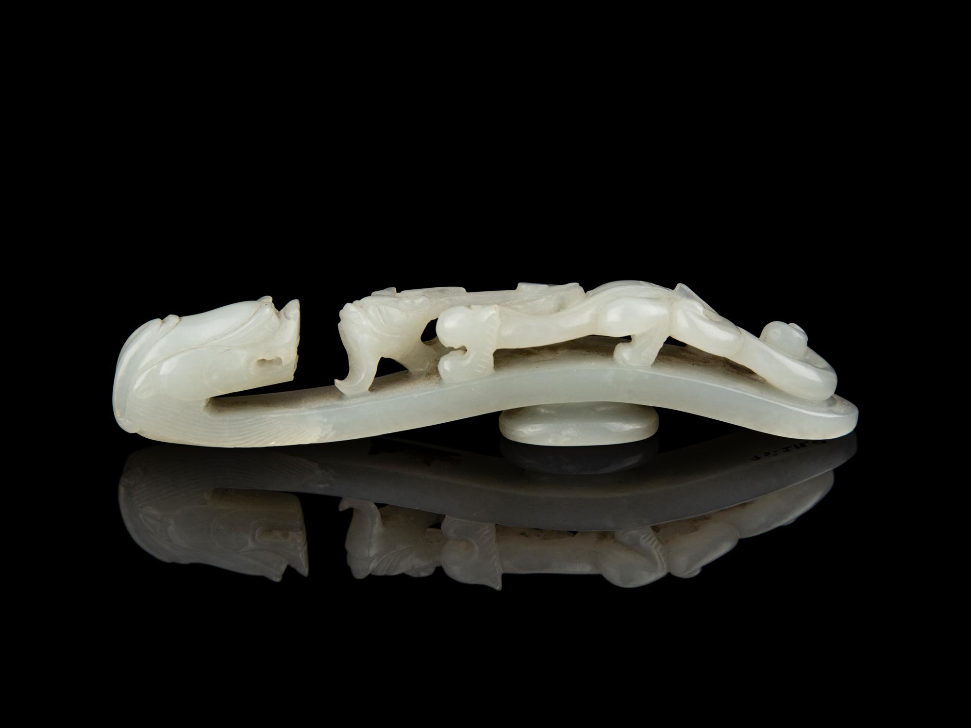 A Chinese White Jade 'Chilong' Belt Hook