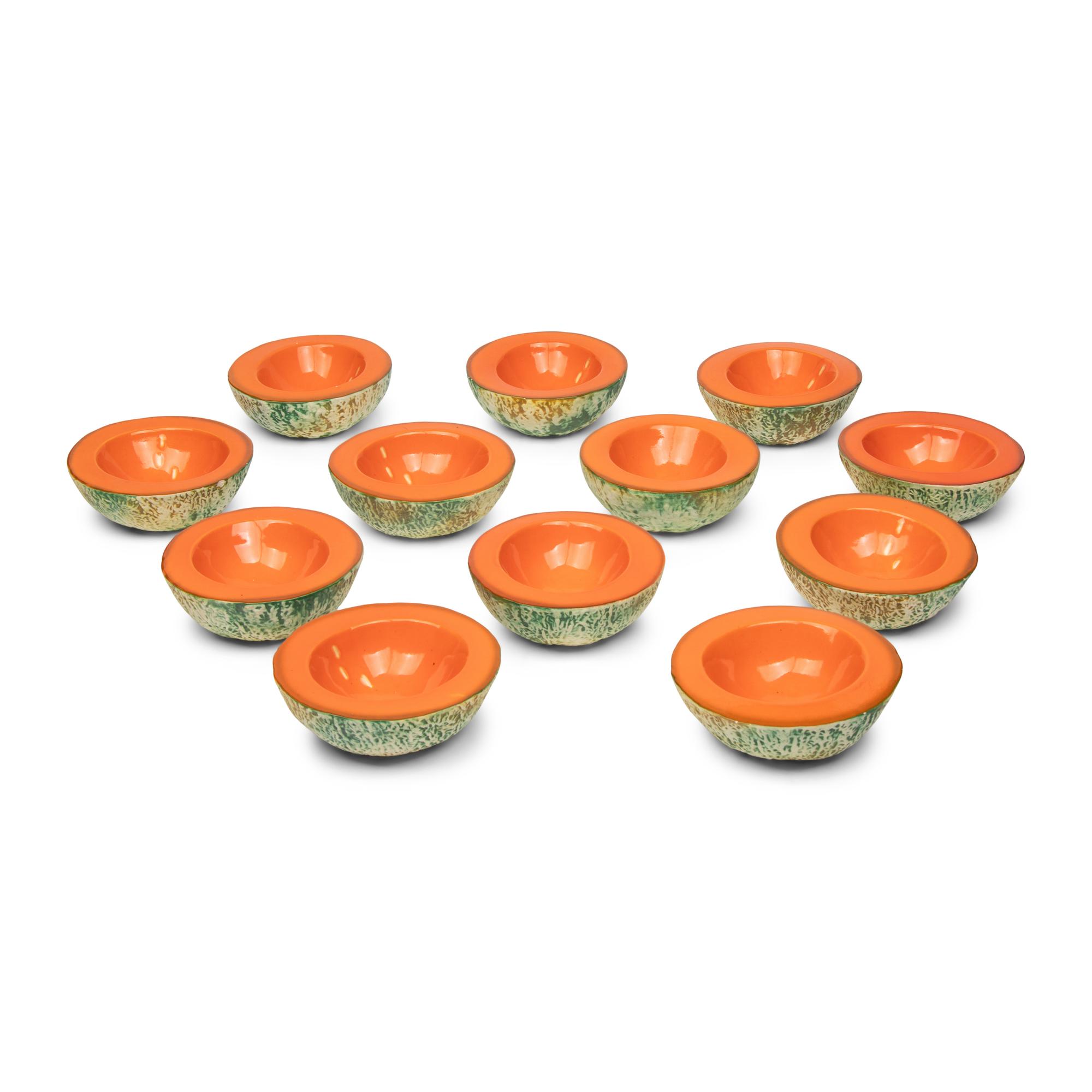 A Set of Twelve Porcelain Melon Bowls by Ed E. Langbein