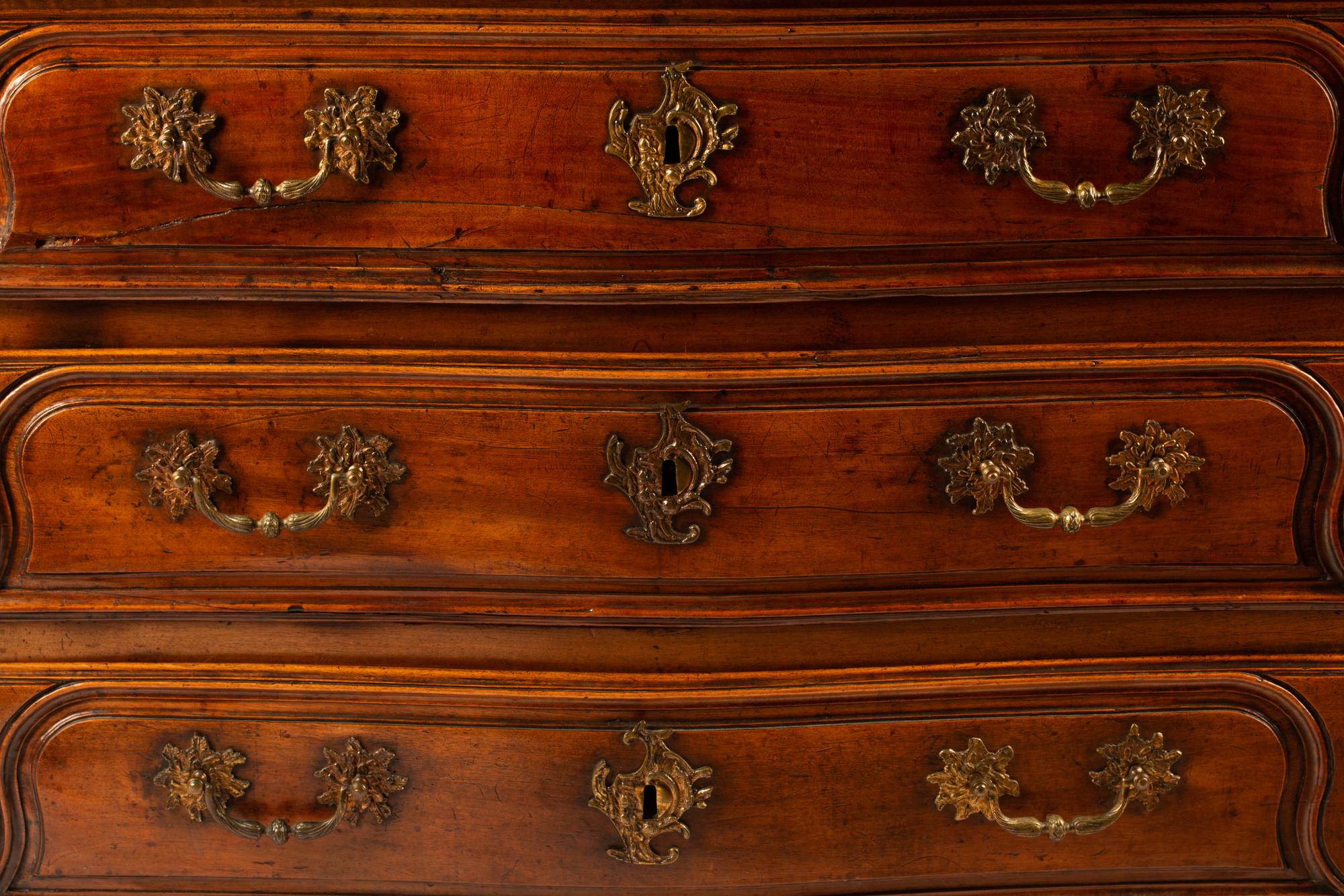 A French Provincial Walnut Chest of Drawers