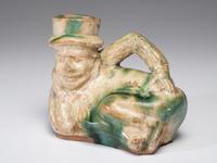 A Lead Glazed Satirical Ceramic Flask