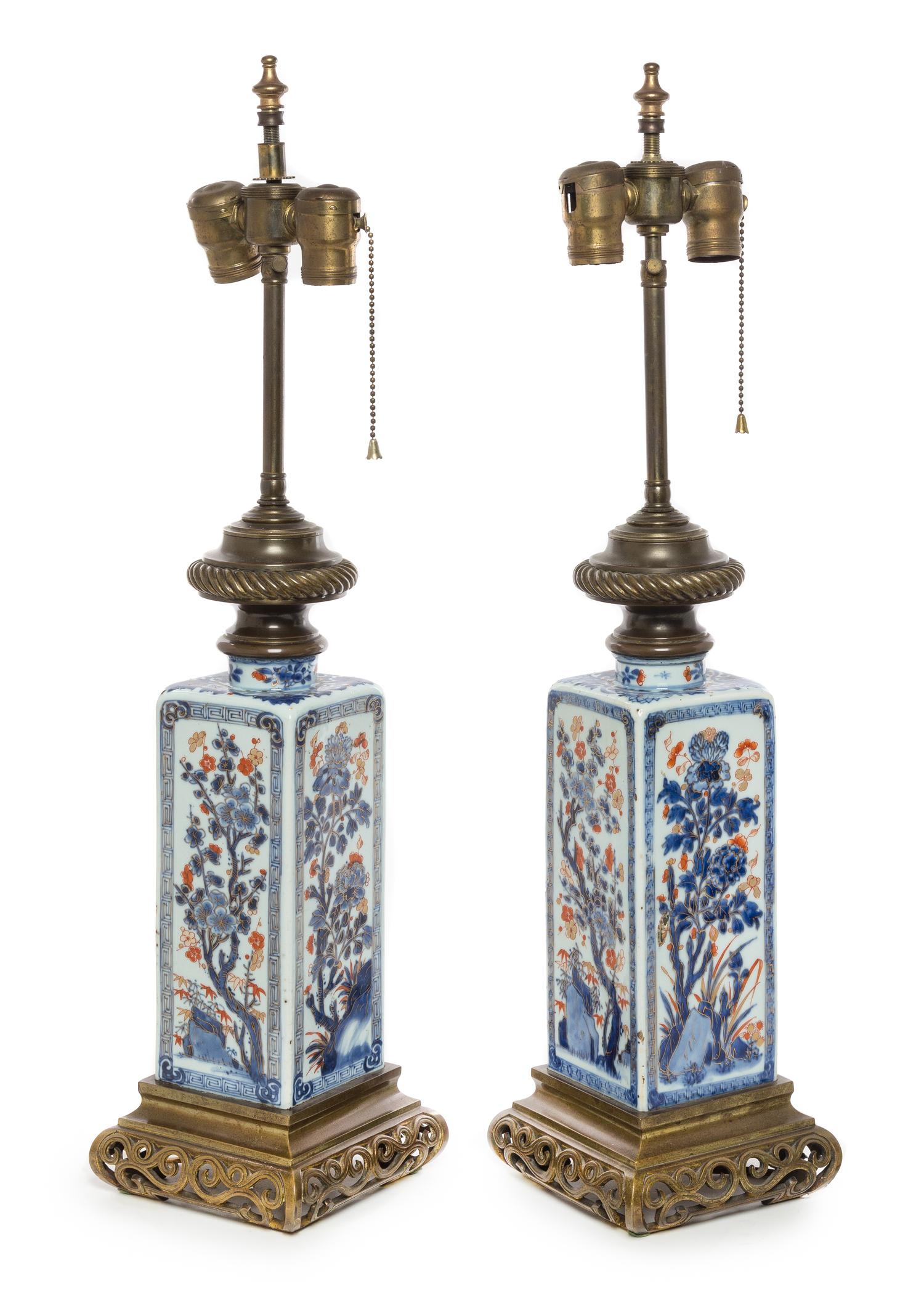 A Pair of Bronze Mounted Chinese Imari Porcelain Vases Height of porcelain 10 inches.