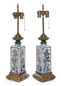 A Pair of Bronze Mounted Chinese Imari Porcelain Vases Height of porcelain 10 inches.
