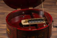 A Regina 'Rookwood ' Paint Decorated 20 Inch Drum Music Box