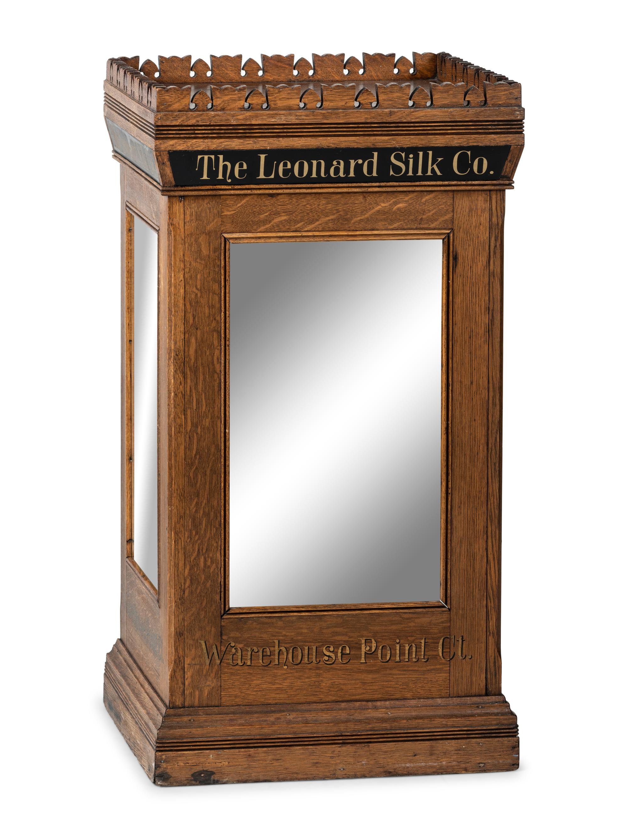 A Leonard Silk Co. Oak Floor Spool Cabinet