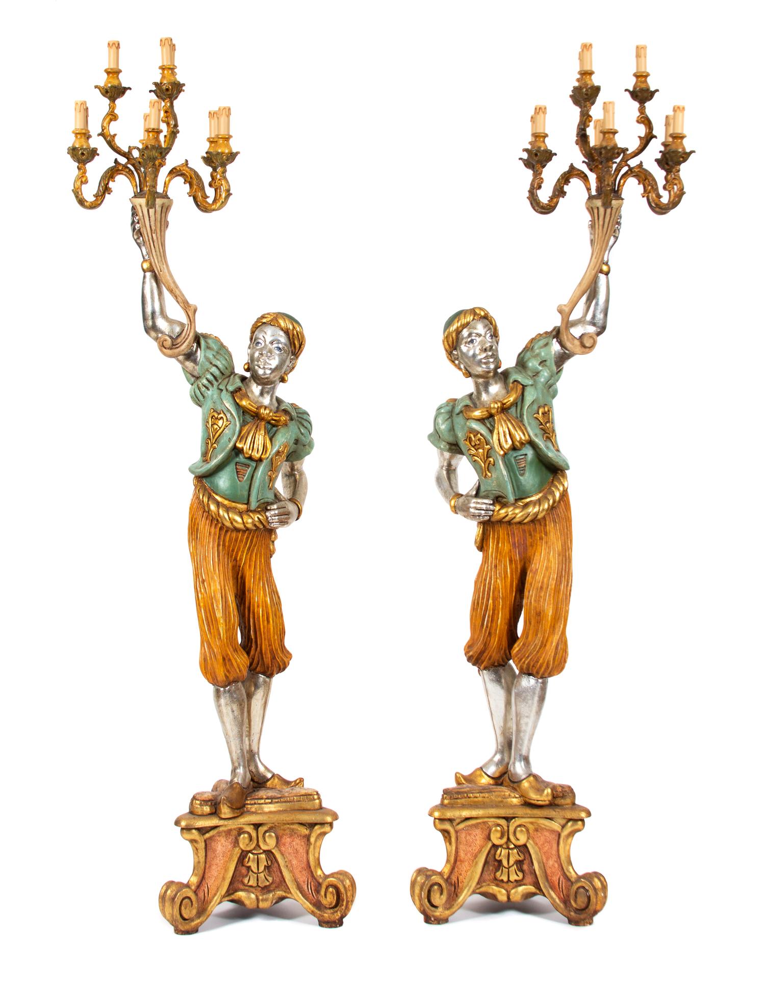 A Pair of Venetian Style Silvered Blackamoors Height 84 x width 22 x depth 20 inches. — 20TH CENTURY