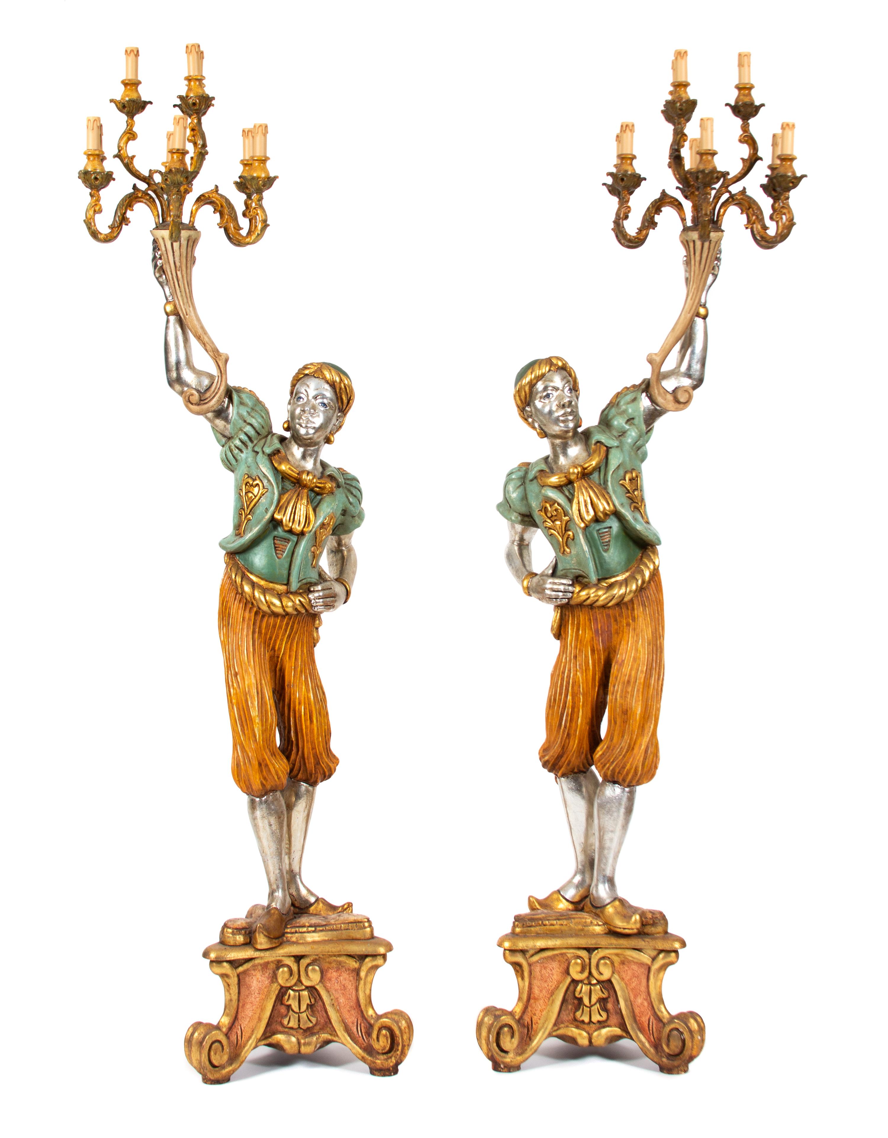 A Pair of Venetian Style Silvered Blackamoors Height 84 x width 22 x depth 20 inches. — 20TH CENTURY