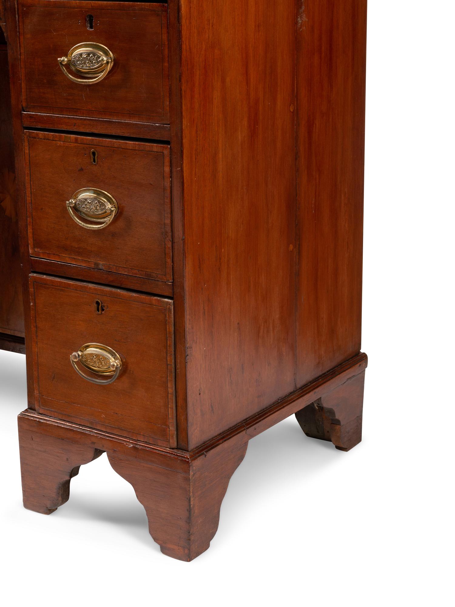 A George III Mahogany Kneehole Desk