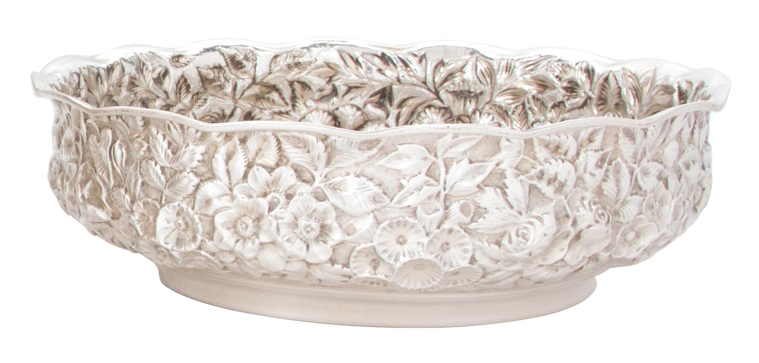 An American Silver Repousse Low Bowl, Hennegan, Bates & Co., Baltimore, Maryland, the circular bowl with scalloped rim and floral repou