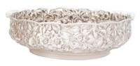 An American Silver Repousse Low Bowl, Hennegan, Bates & Co., Baltimore, Maryland, the circular bowl with scalloped rim and floral repou