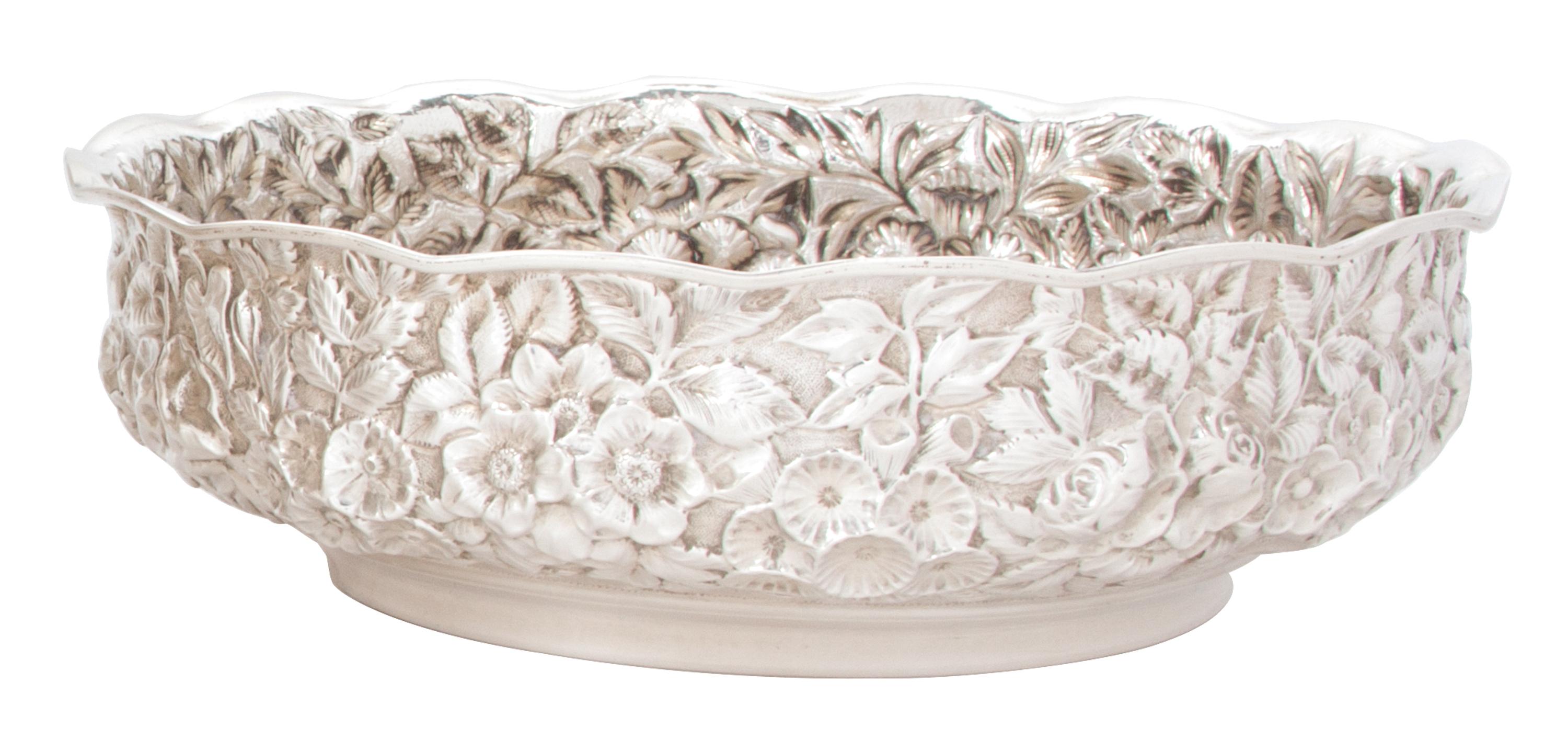 An American Silver Repousse Low Bowl, Hennegan, Bates & Co., Baltimore, Maryland, the circular bowl with scalloped rim and floral repou
