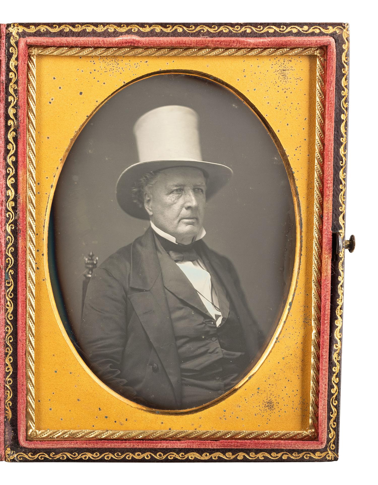 [EARLY PHOTOGRAPHY]. A pair of cased images of serious men, highlighted by an example featuring a man wearing a top hat by Mathew BRADY.