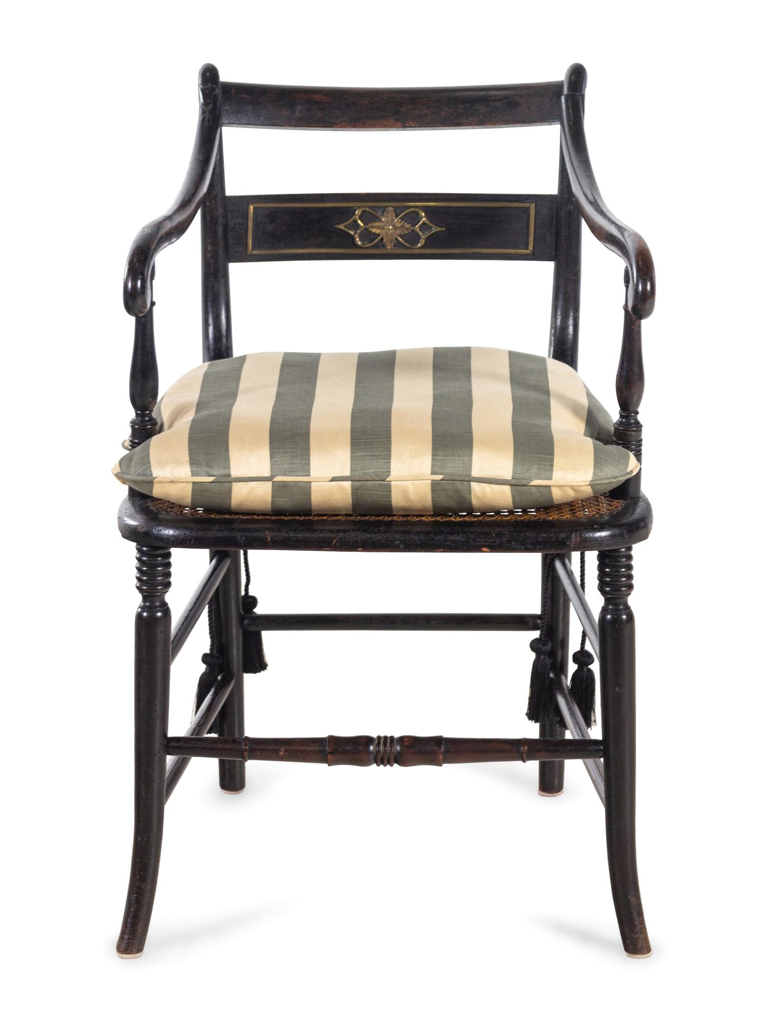 A Regency Stenciled and Ebonized Armchair