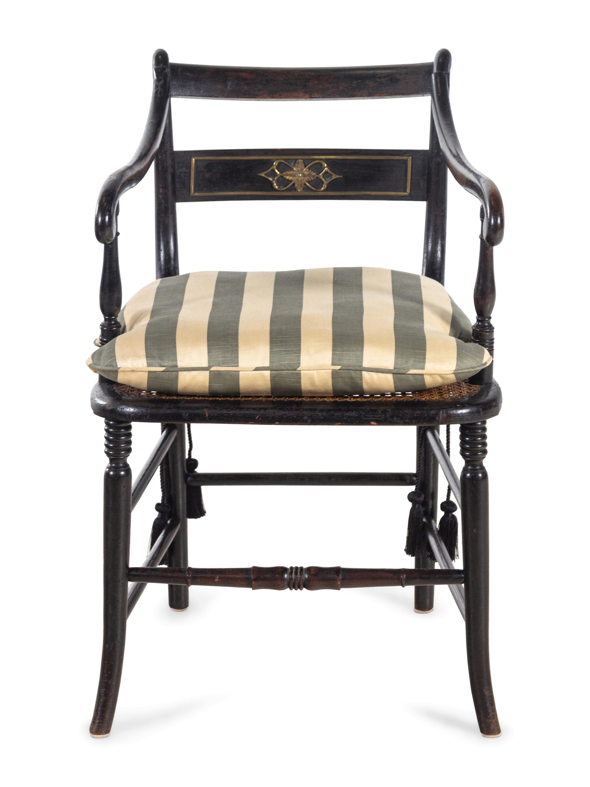 A Regency Stenciled and Ebonized Armchair