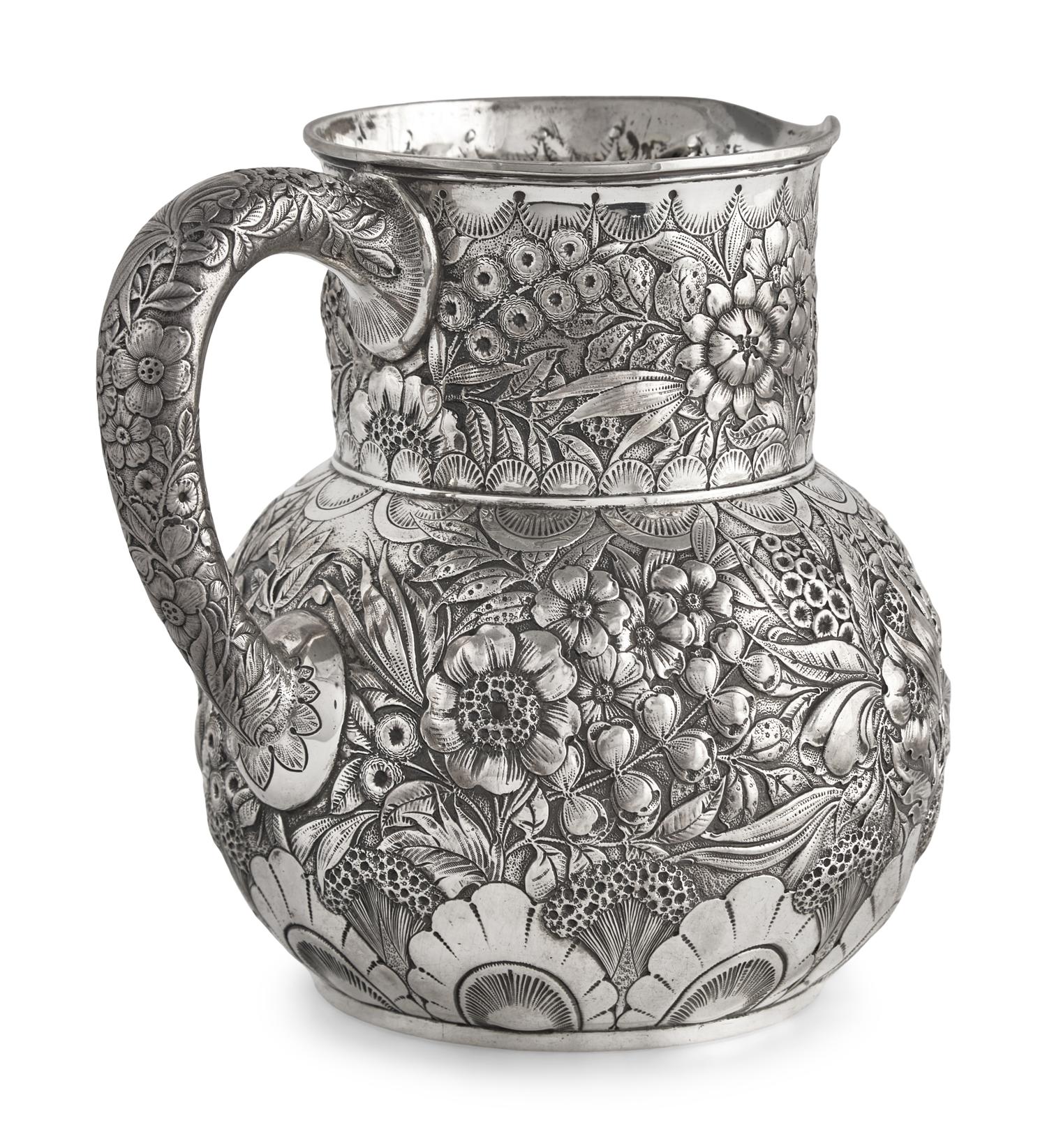 A Sterling Silver Floral Repousse Water Pitcher, Tiffany & Co., New York, NY, Circa 1880