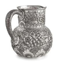 A Sterling Silver Floral Repousse Water Pitcher, Tiffany & Co., New York, NY, Circa 1880