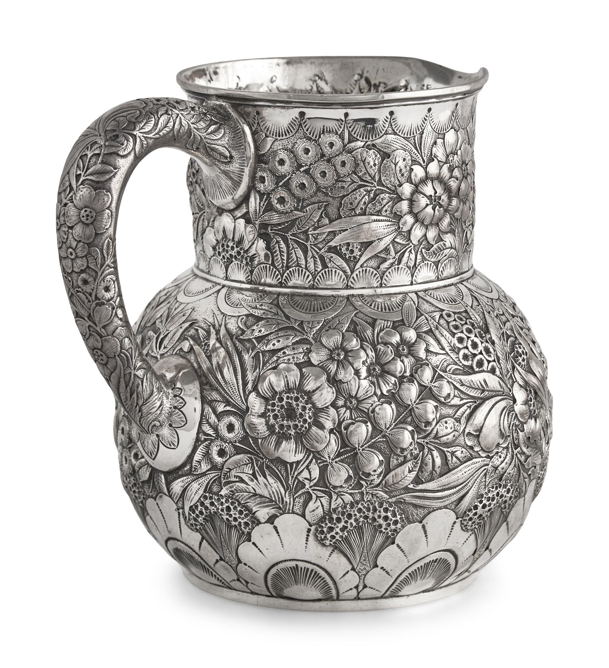 A Sterling Silver Floral Repousse Water Pitcher, Tiffany & Co., New York, NY, Circa 1880