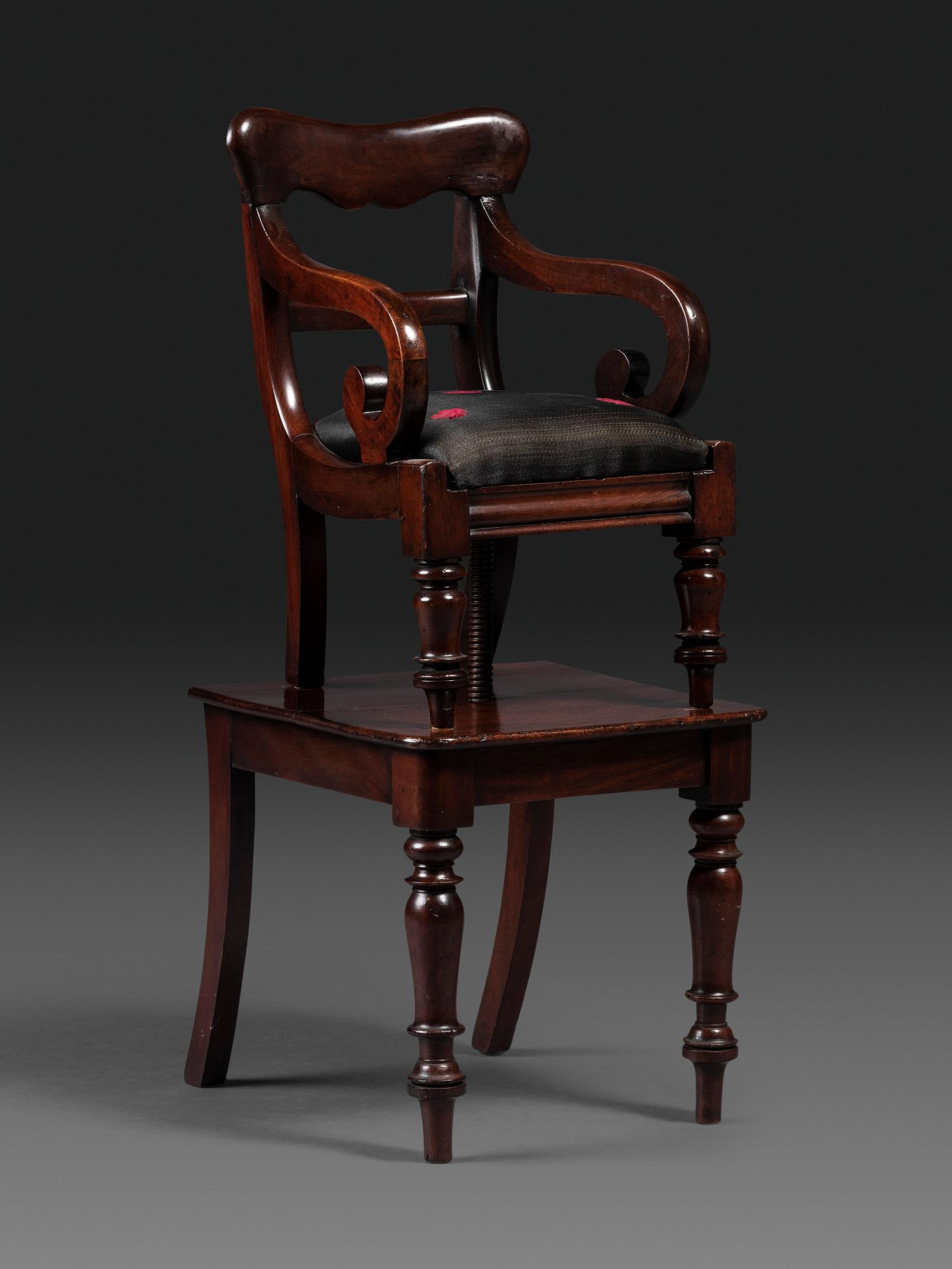 A Classical Carved Mahogany Child's Chair on Stand