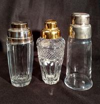 Three Cocktail Shakers Height of tallest 9 inches.