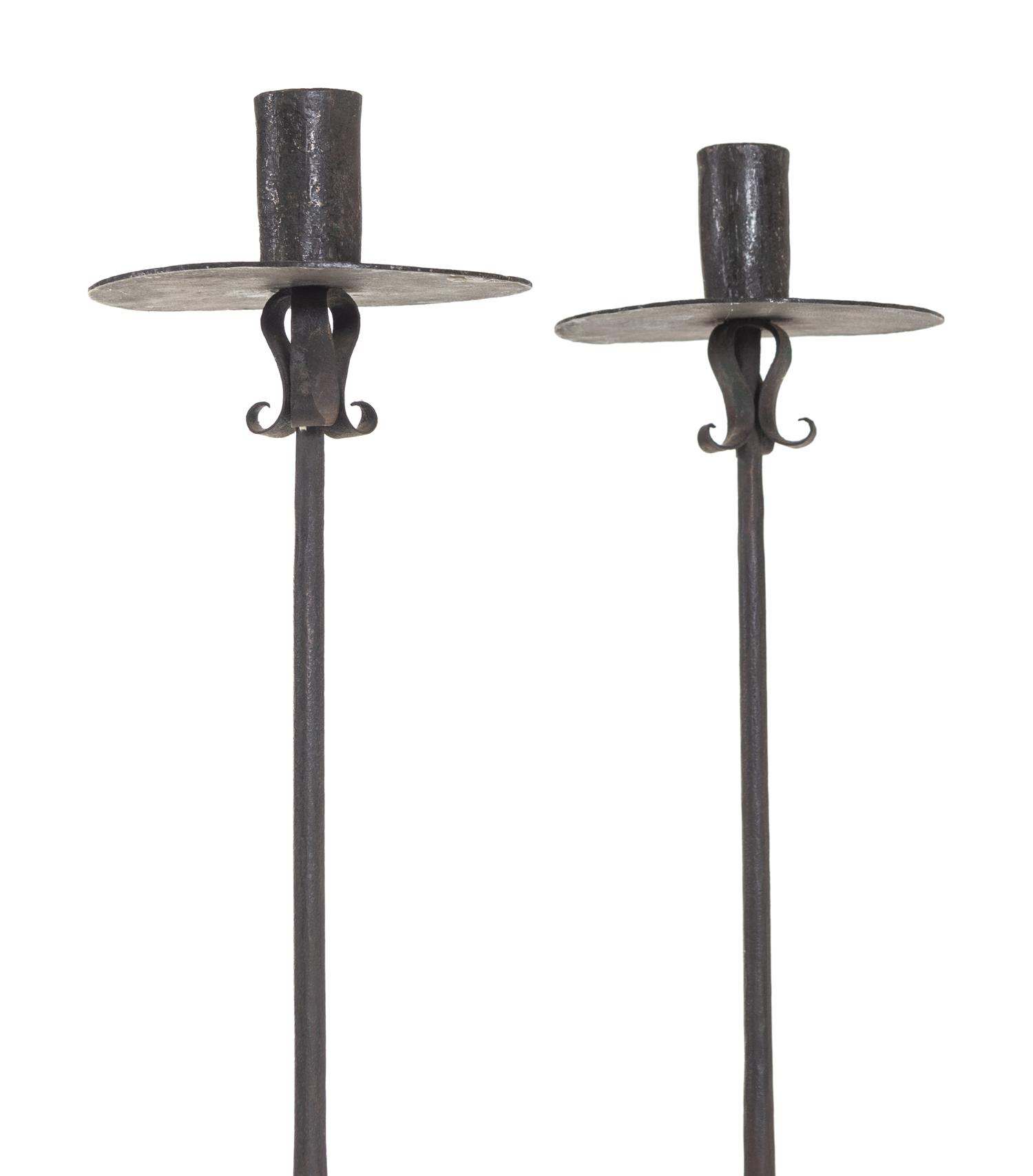 A Pair of Spanish Wrought Iron Floor Candlesticks